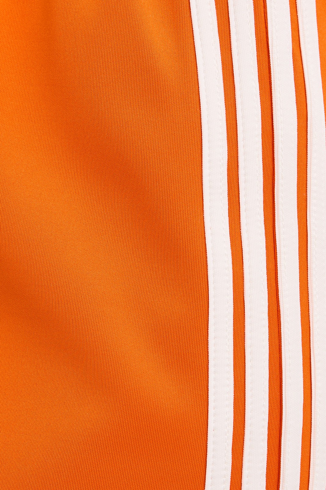 bow detail track mini skirt in orange and white