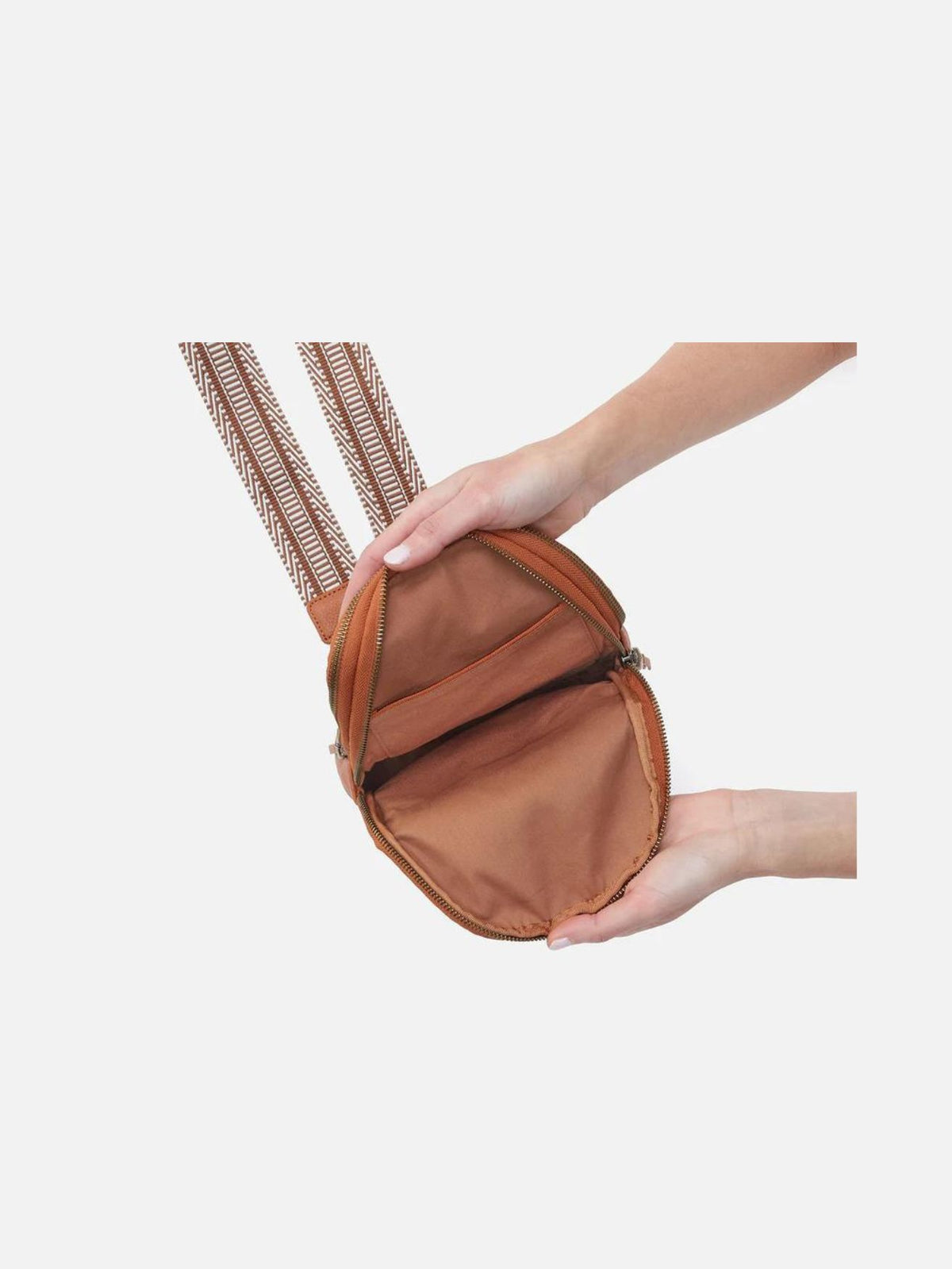 hobo cass pebbled leather sling bag in butterscotch-inside