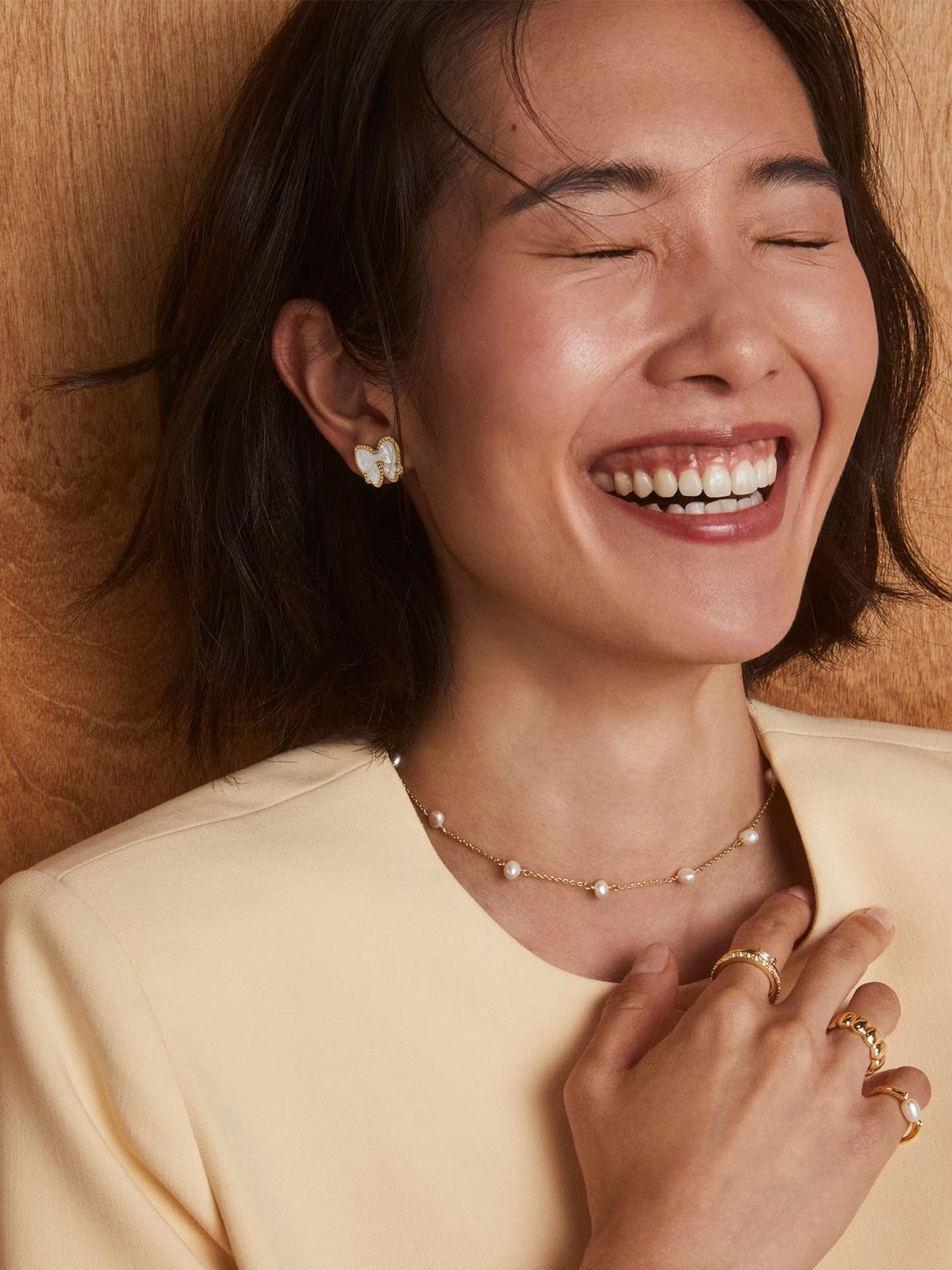 Kendra Scott Haley Bow Gold Studs in Ivory Mother-of-Pearl