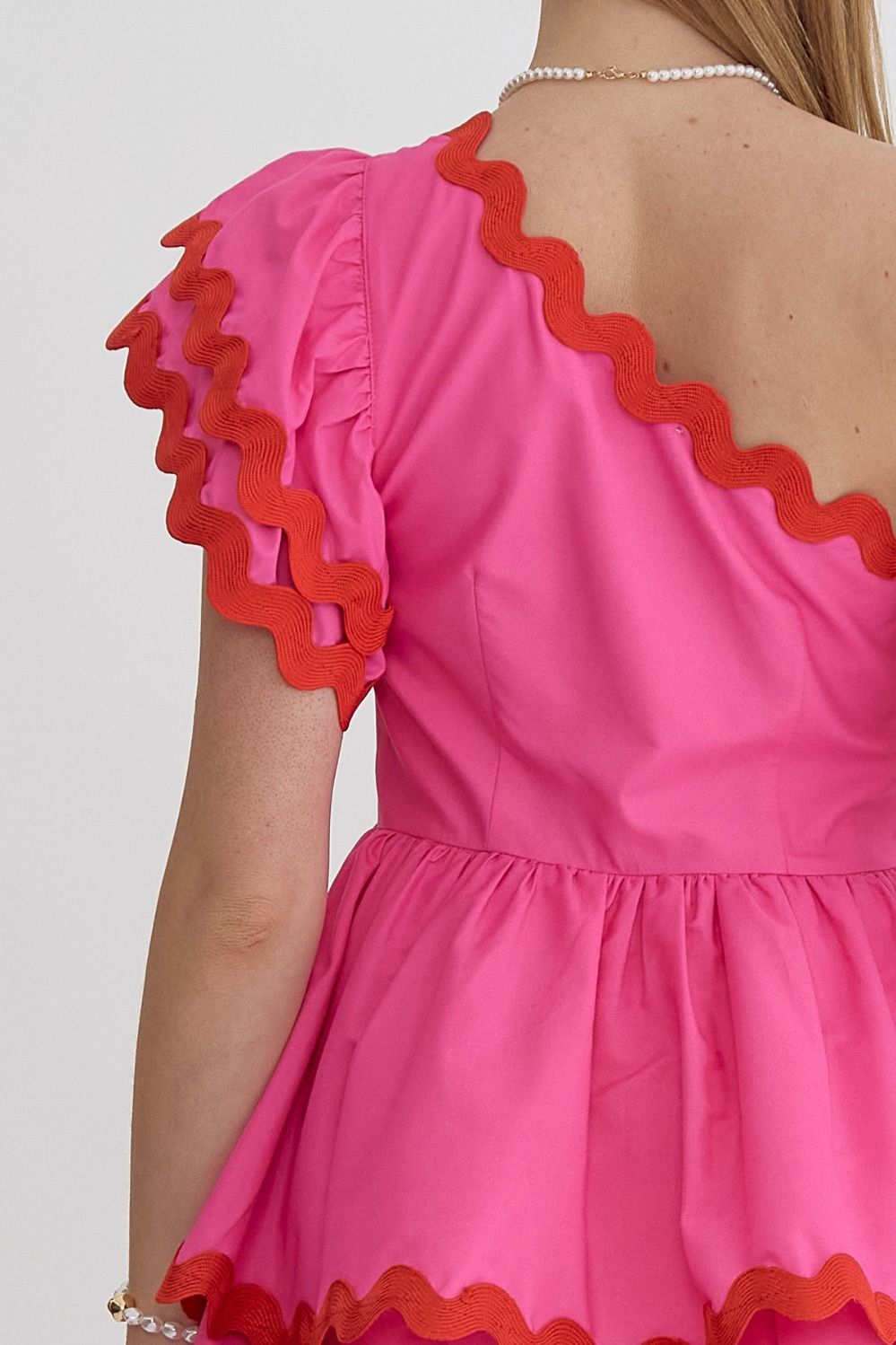 one shoulder dress with ric rack detail in pink-back detail view