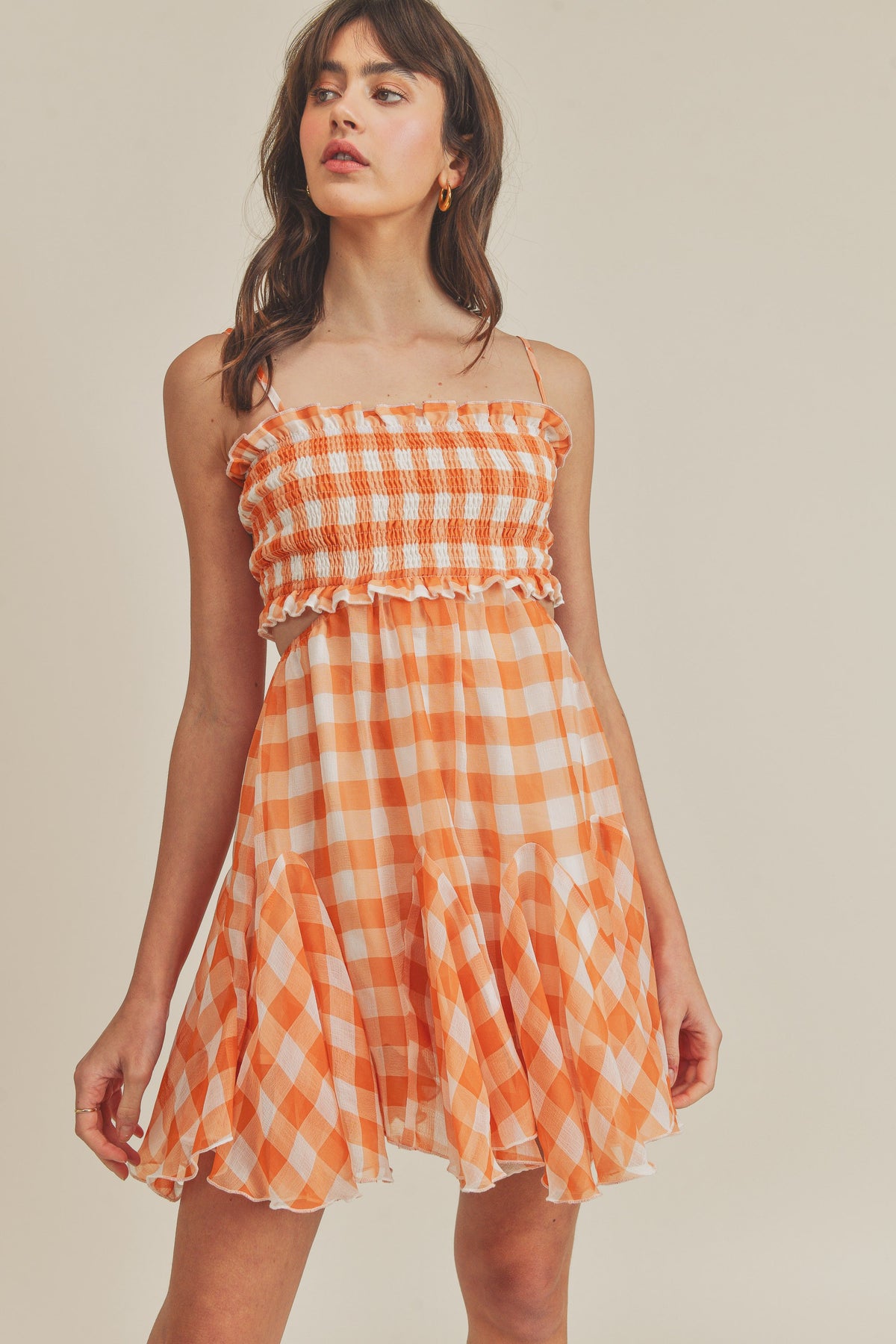 tennessee orange gingham smocked top ruffle bottom cutout detail dress in orange-front