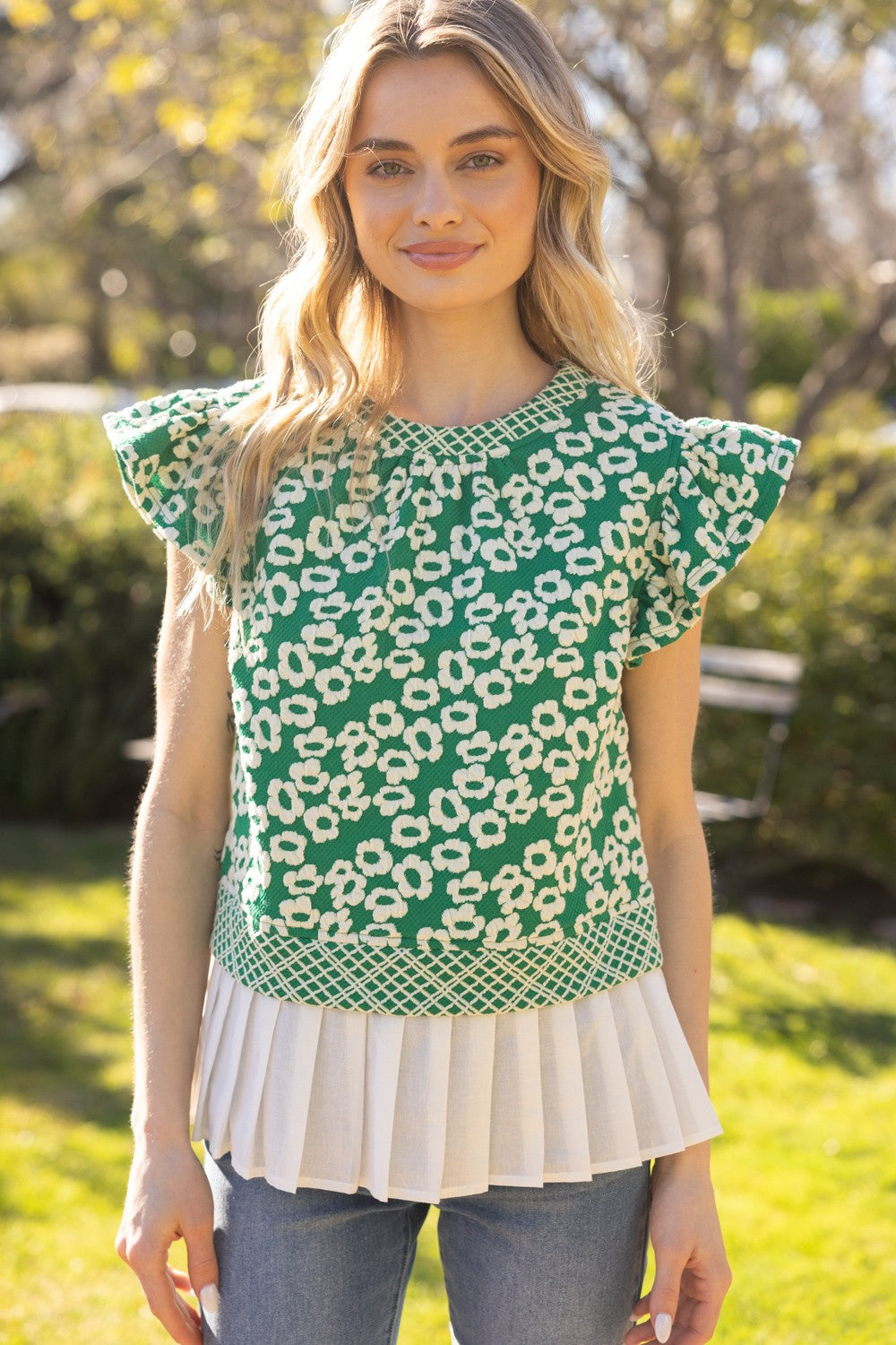 pleated hem printed knit top in green-front view