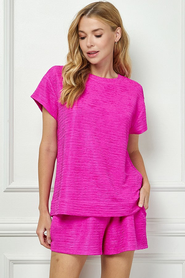 textured short sleeve top in fuchsia-front