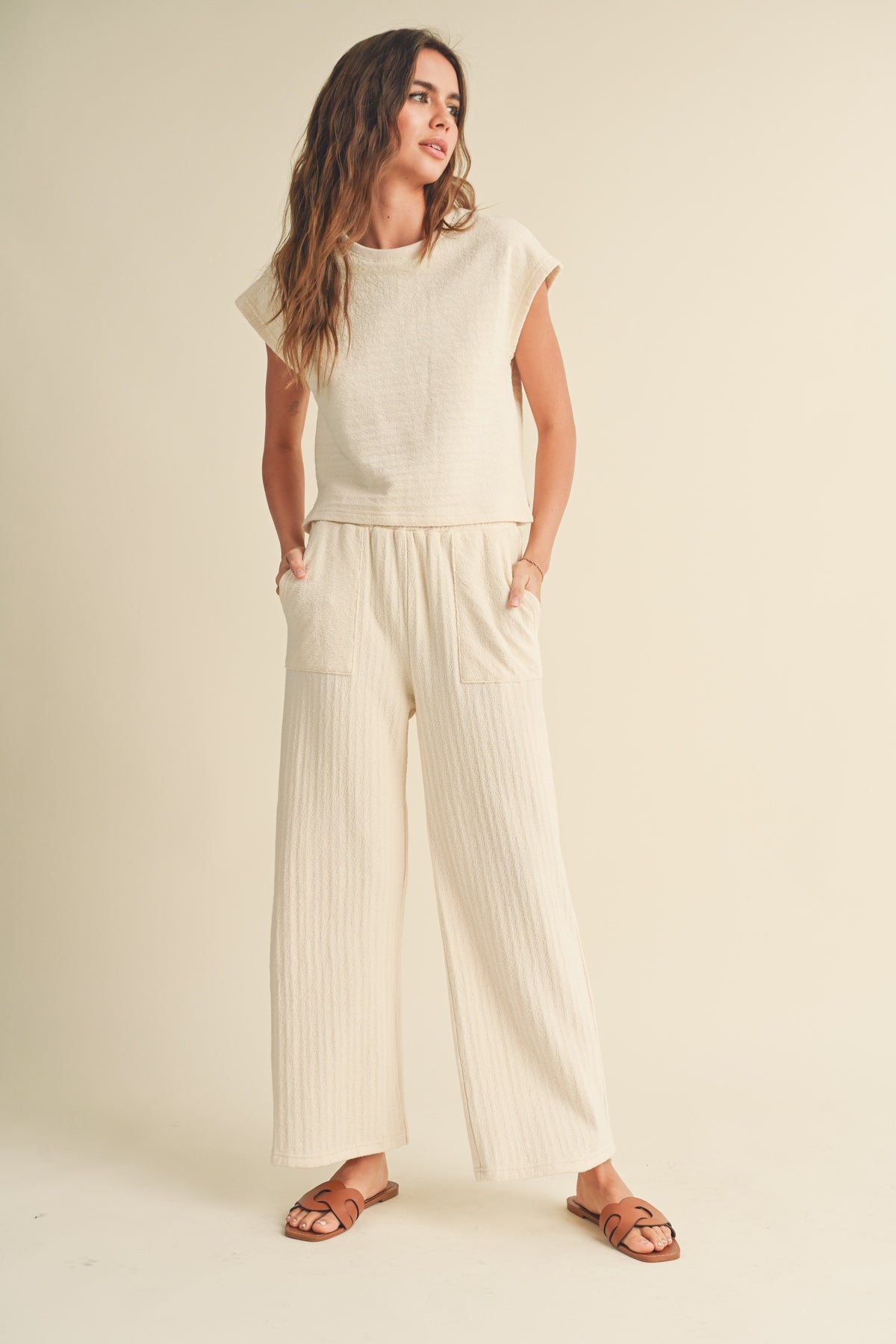 textured strip knitted pants in cream-set view