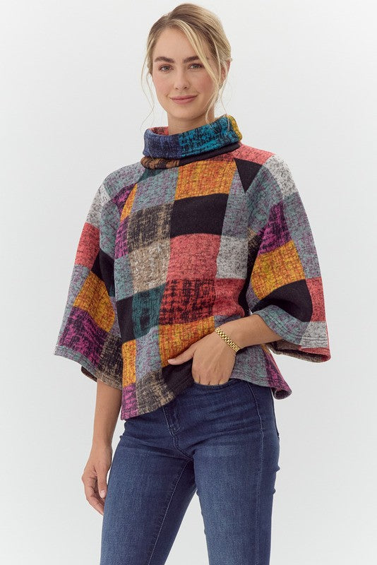 multi color plaid cropped pullover top in brick-front