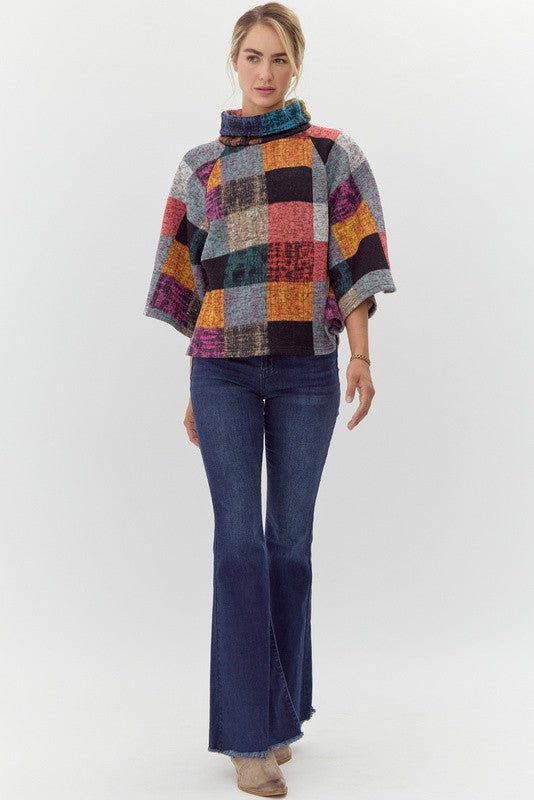 multi color plaid cropped pullover top in brick-front