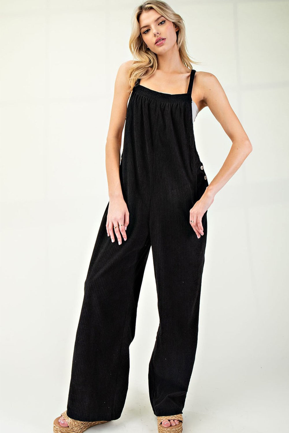 button detail corduroy overalls in black-front