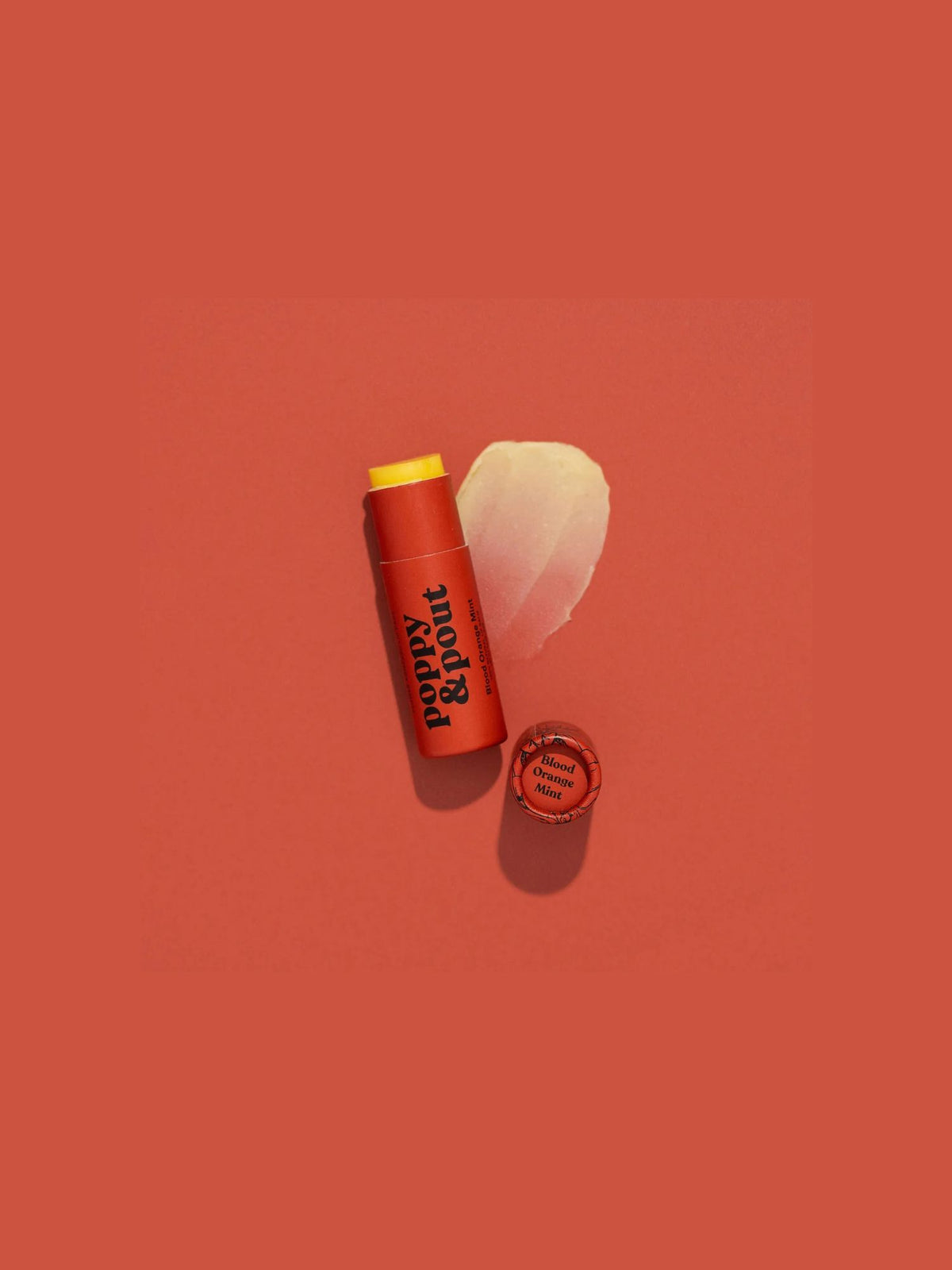 poppy & puut lip balm in blood orange mint