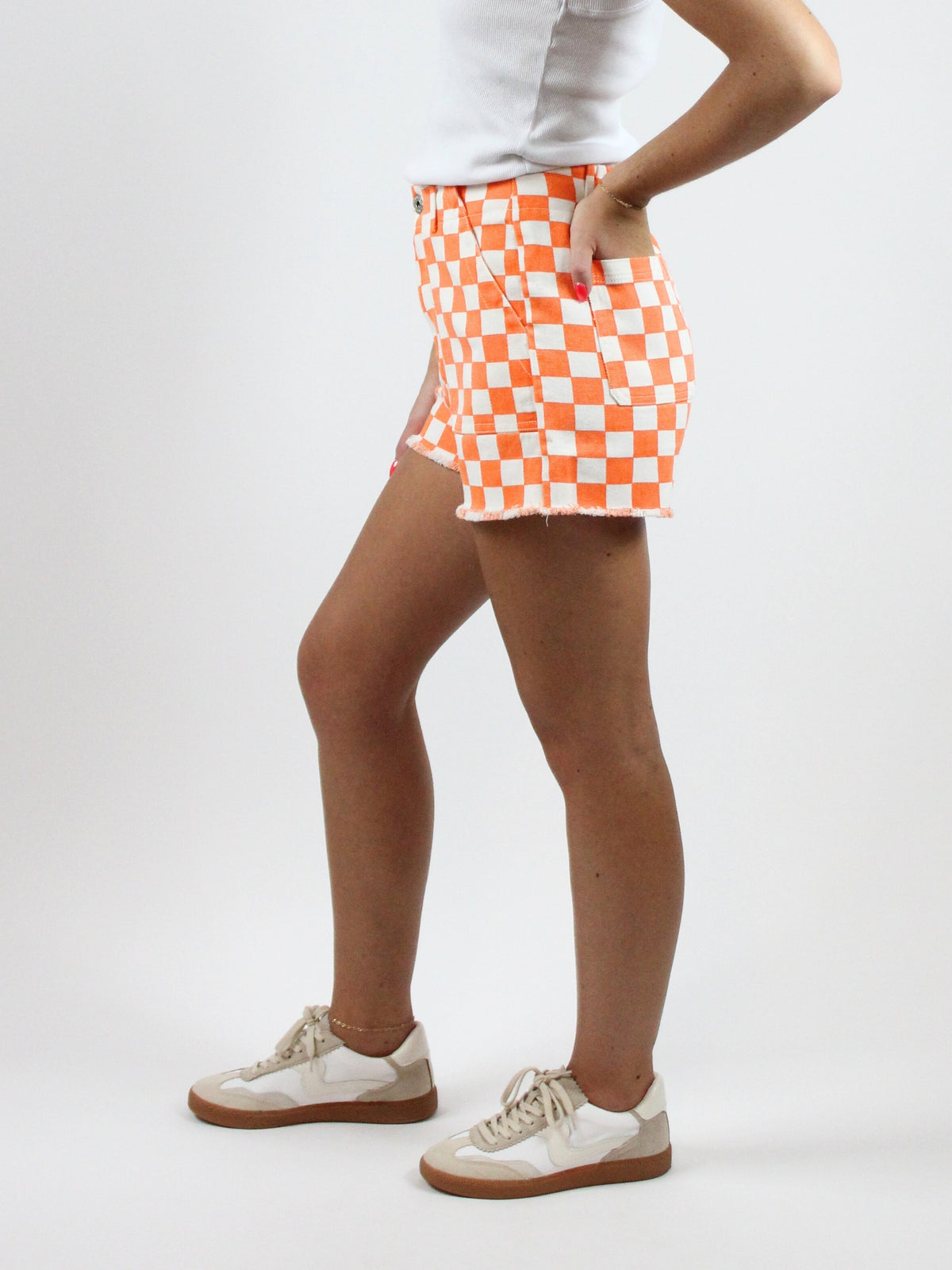 checker neyland orange and white cutoff denim shorts- side view