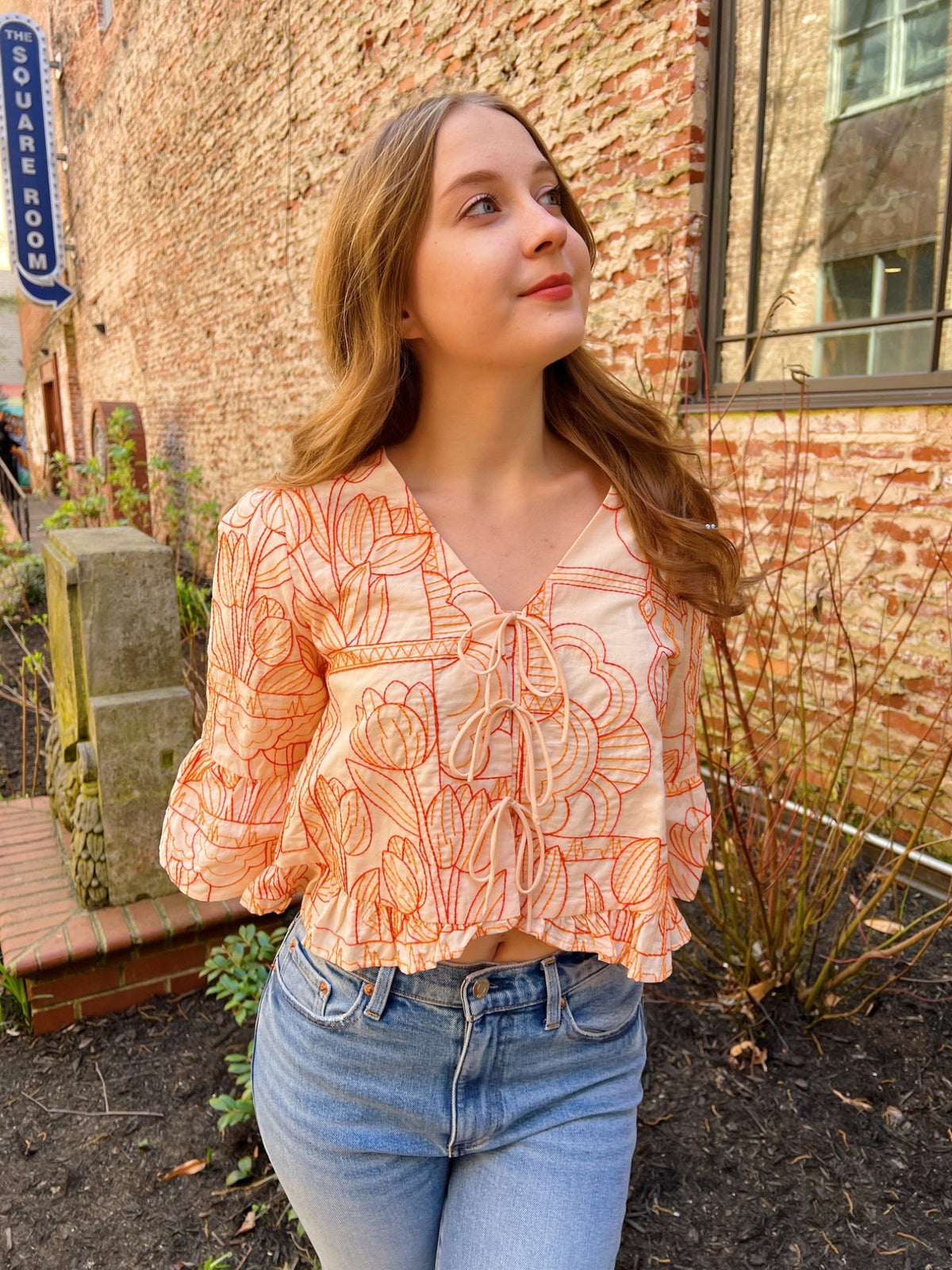Adelyn Rae Rosalie Tie Front Ruffle Sleeve Embroidered Top orange white