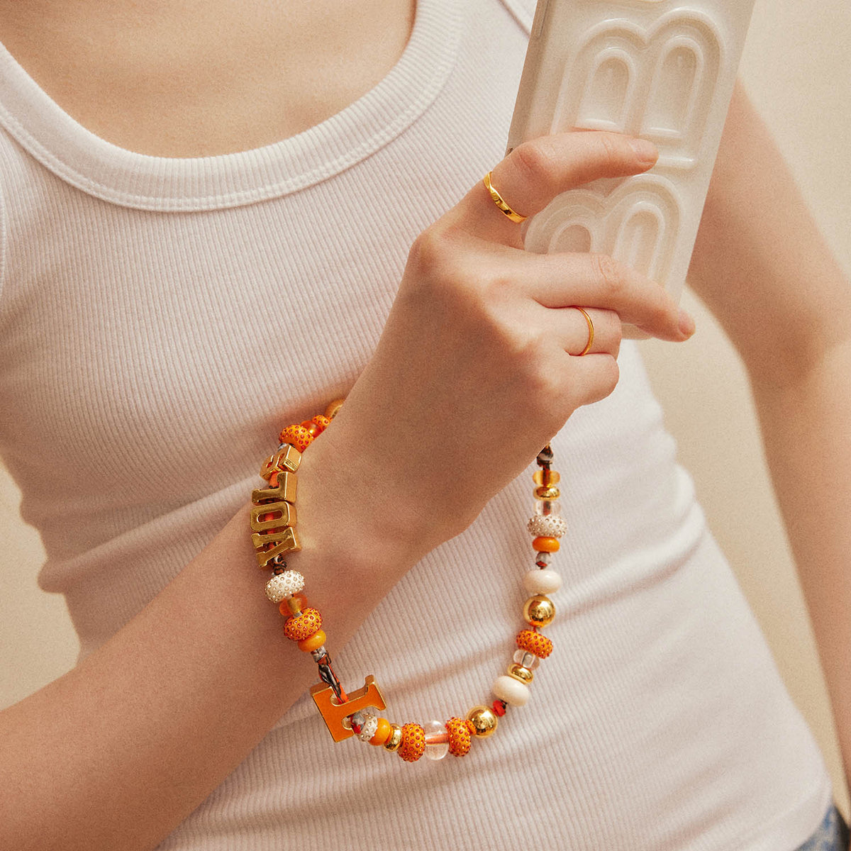 BaubleBar® University of Tennessee Beaded Bandana Phone Charm