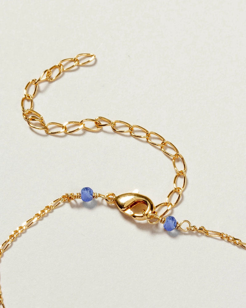bermuda triangle dainty collar necklace in 14kt gold plated brass and tanzanite by luna norte jewelry