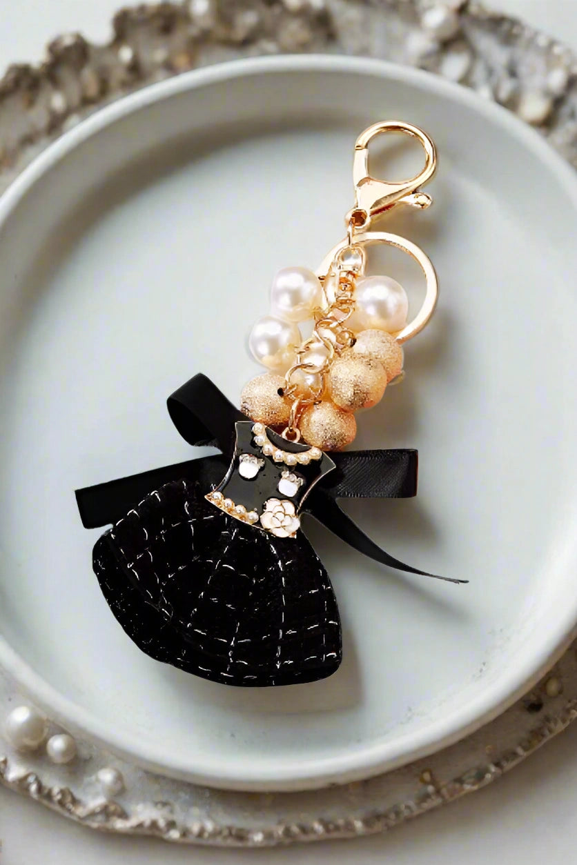 bag charm black dress with bow faux pearls gold beads keychain