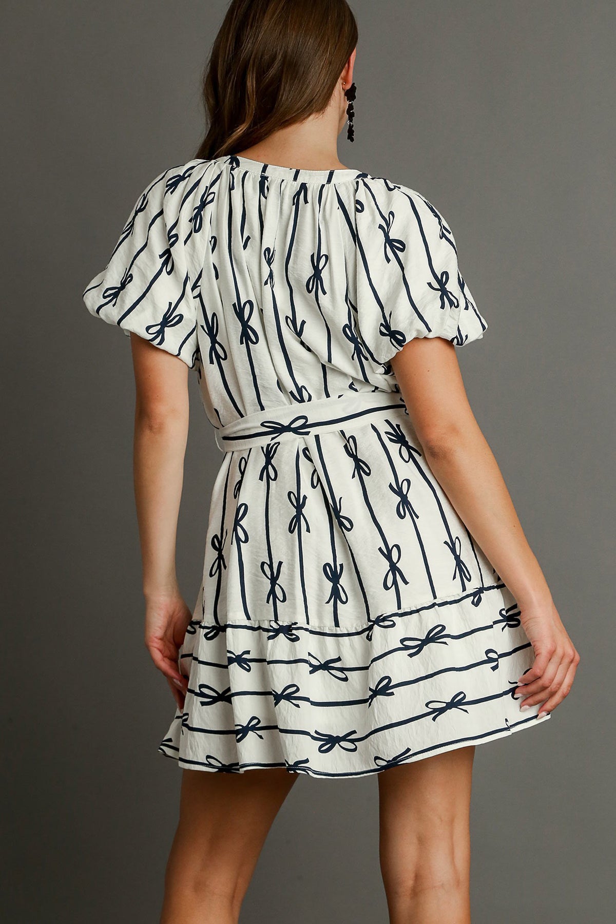 bow print flutter button down dress in off white navy-back