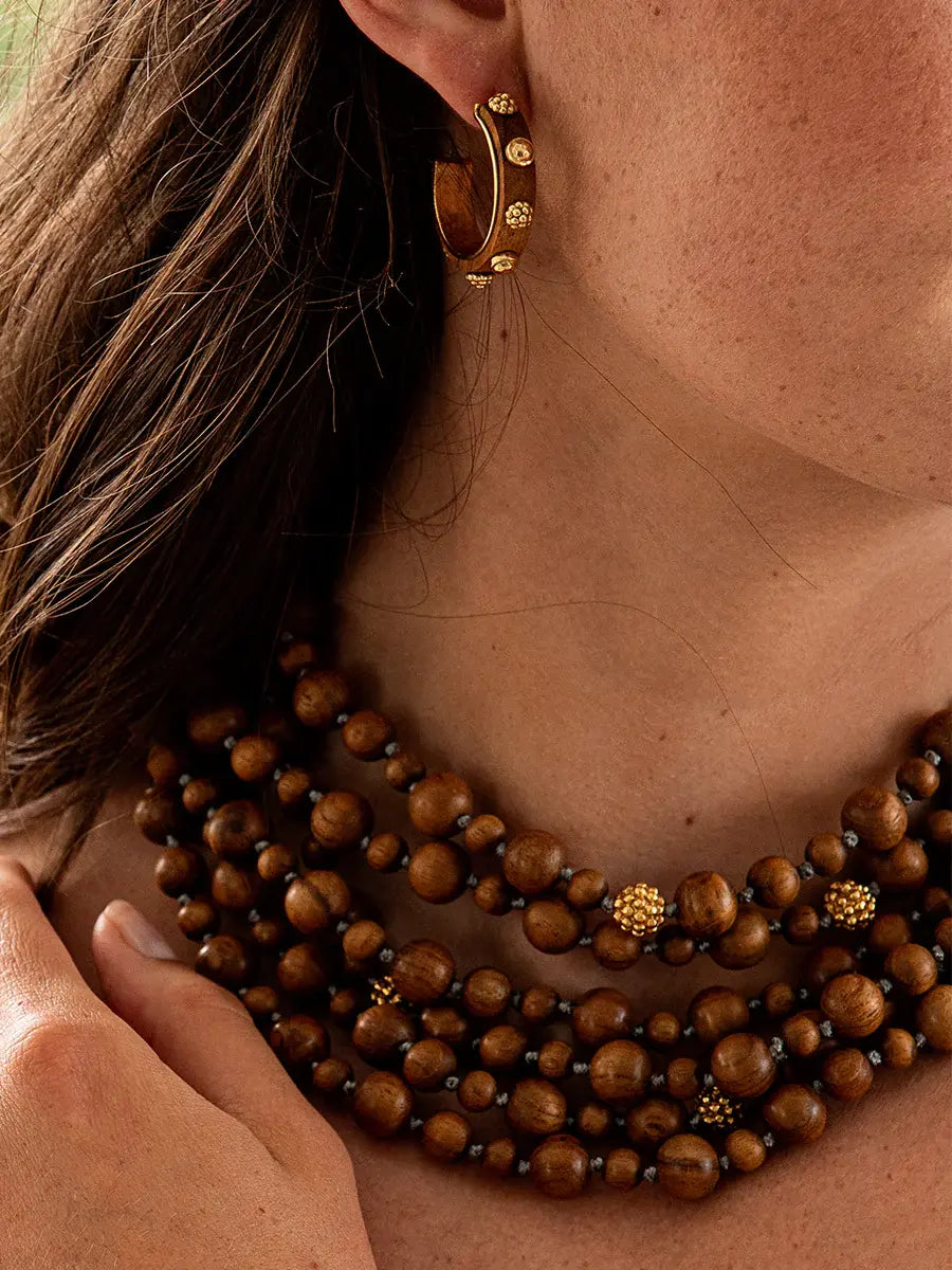 capucine de wulf gaia hoop earrings in 18k gold and teak wood