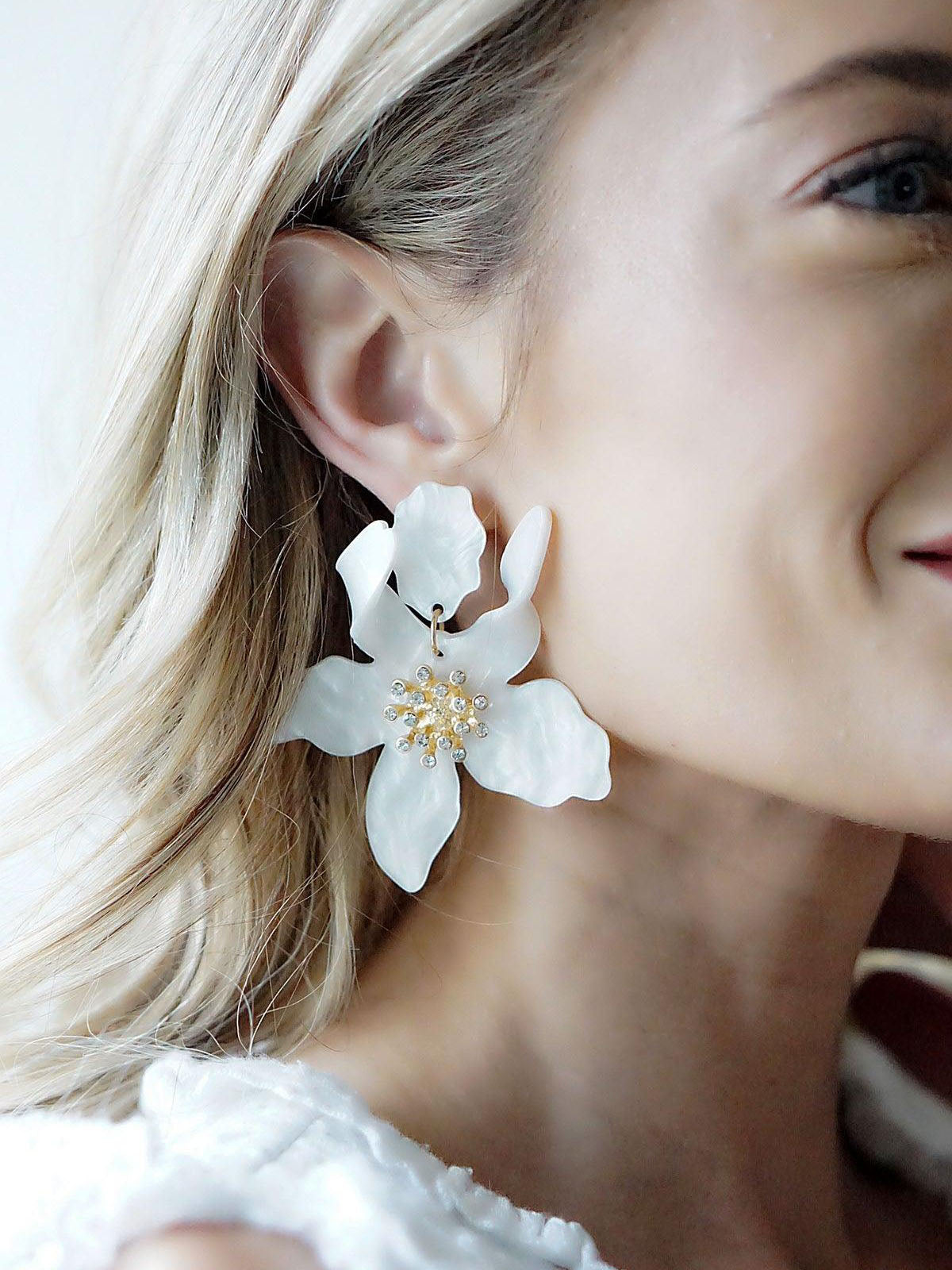 chloe resin flower statement earrings in white