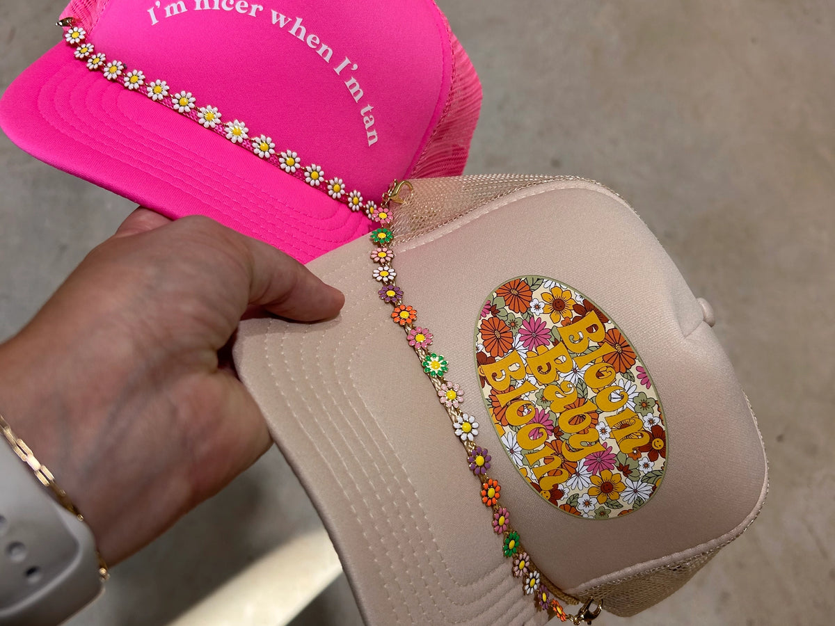 trucker hat chain with colorful daisy charms