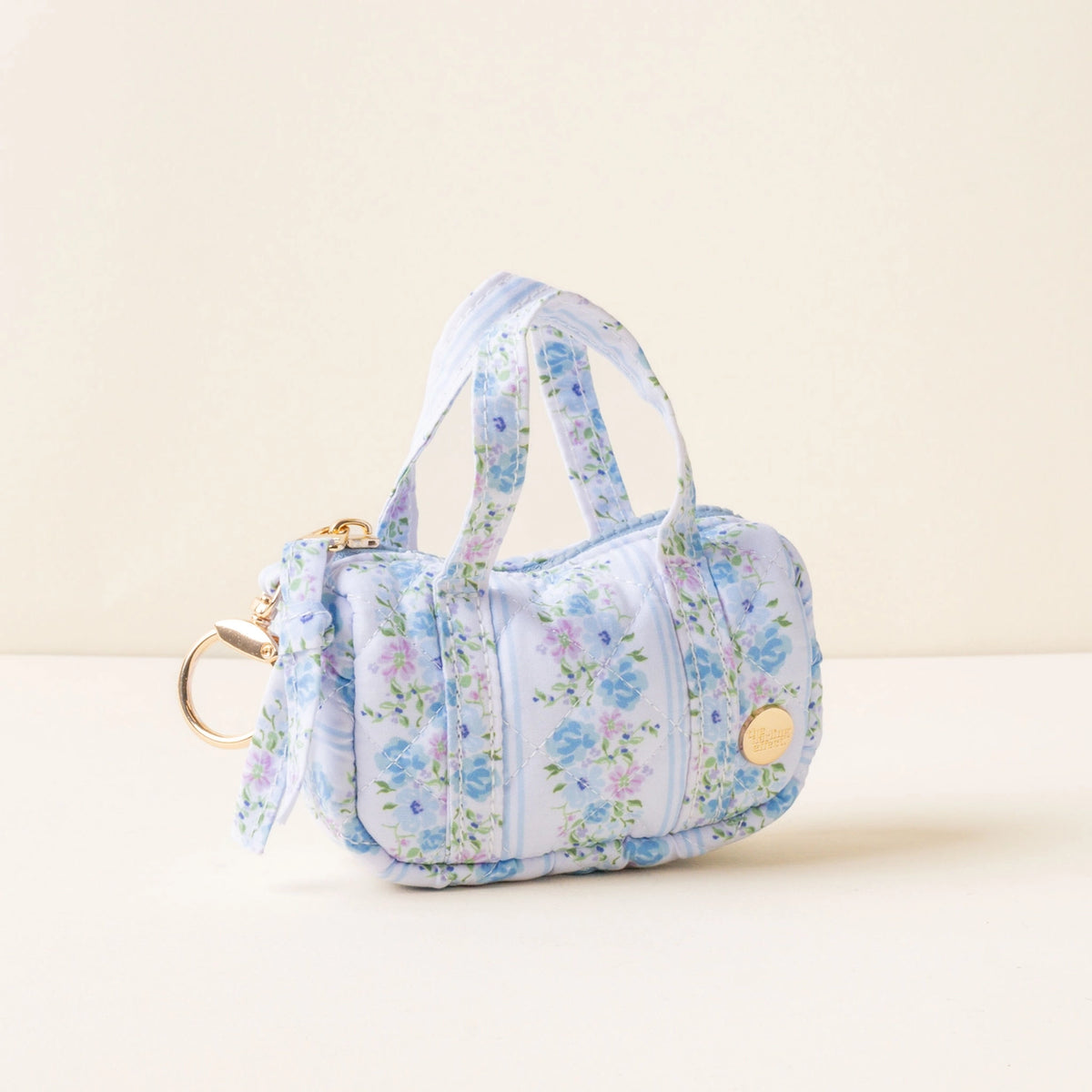 Light Blue White Purple Floral Mini Duffle Bag Bag Charm on Cream Background Darling Effect Itty Bitty Duffle Bag Charm Petal Parade Blue