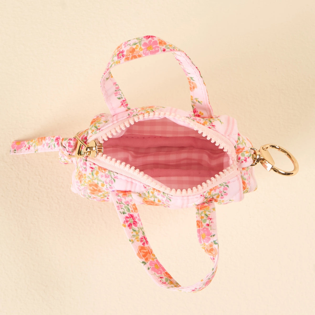 interior open bag Light Pink Orange Hot Pink Floral Mini Duffle Bag Bag Charm on Cream Background Darling Effect Itty Bitty Duffle Bag Charm Petal Parade Pink