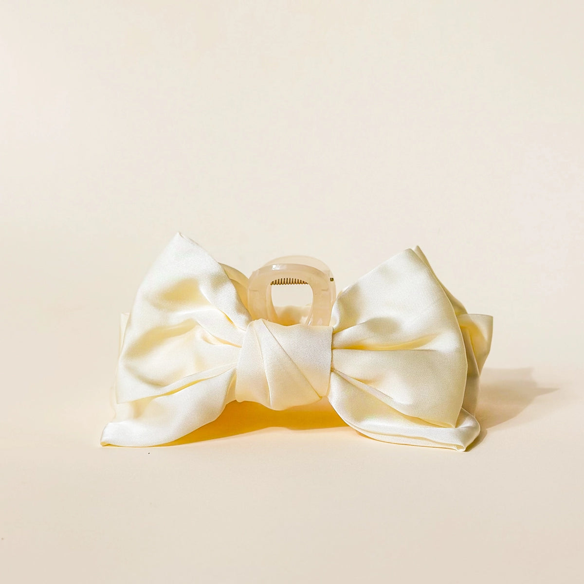 cream claw clip hair bow on cream background Darling Effect Satin Bow Claw Hair Clip Cream