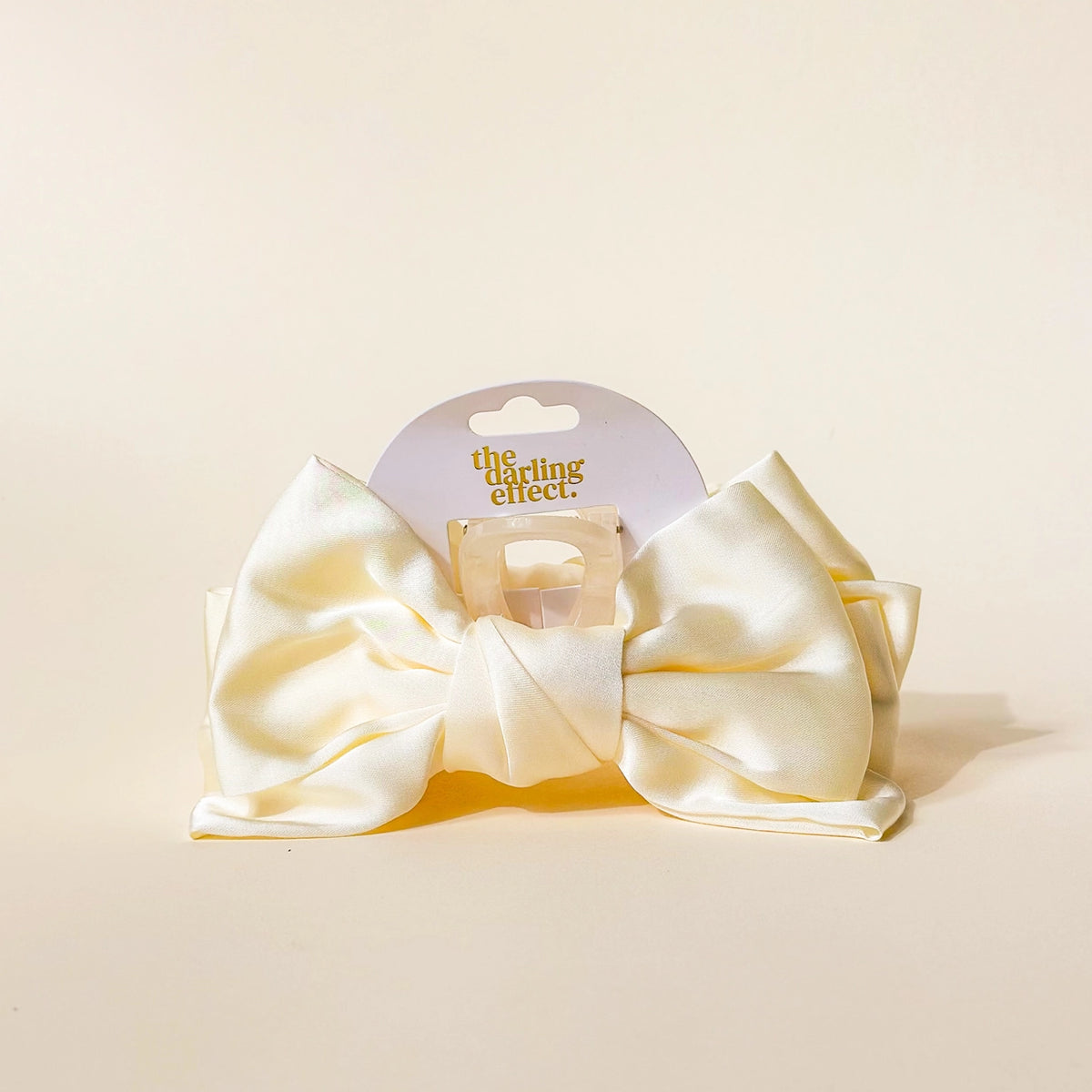 cream claw clip hair bow on cream background Darling Effect Satin Bow Claw Hair Clip Cream