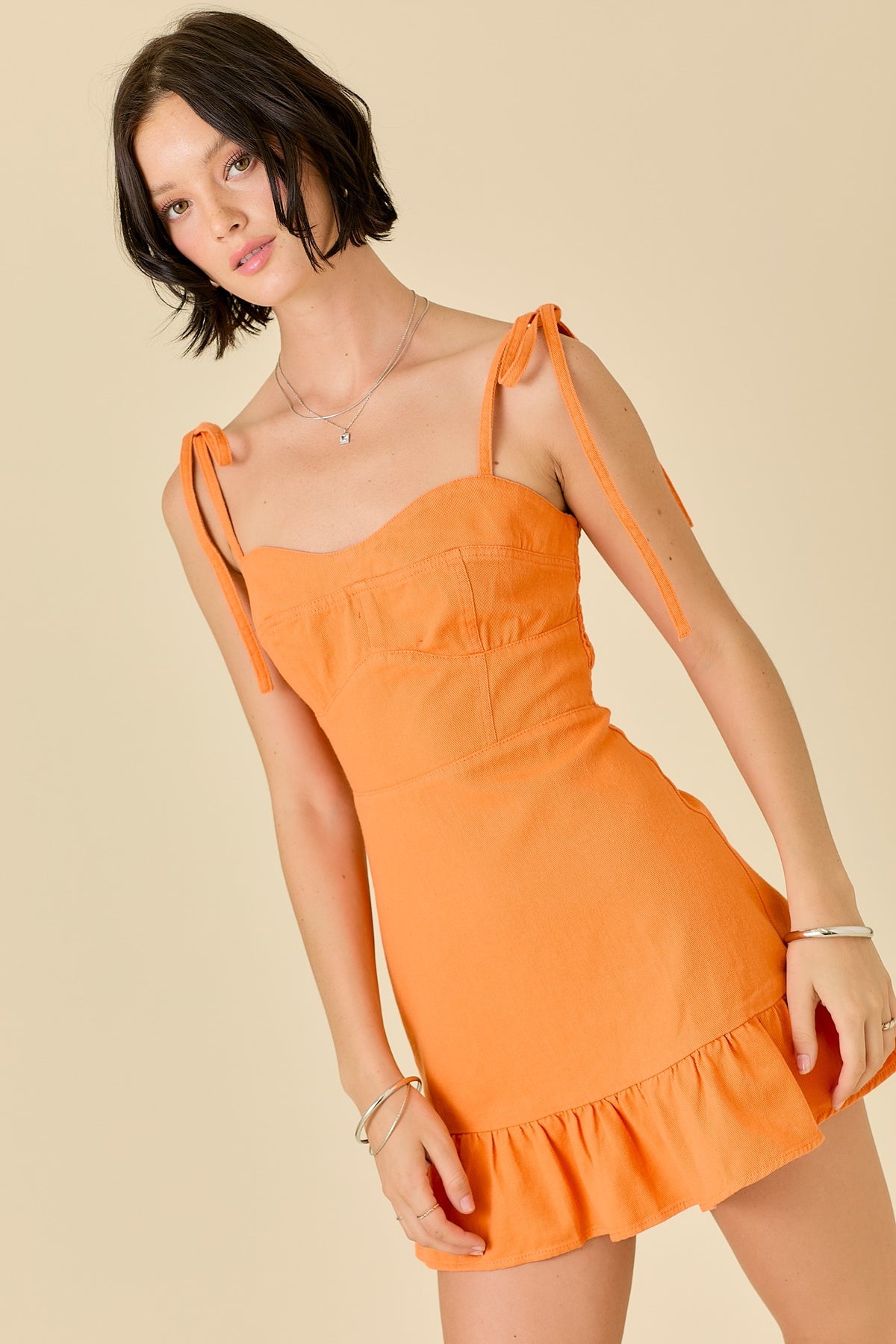 denim mini dress with ruffle hem shoulder ties in tennessee orange-front