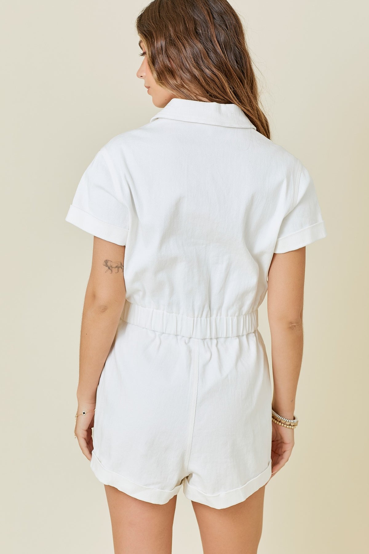 denim romper with elastic waistband in white-back view