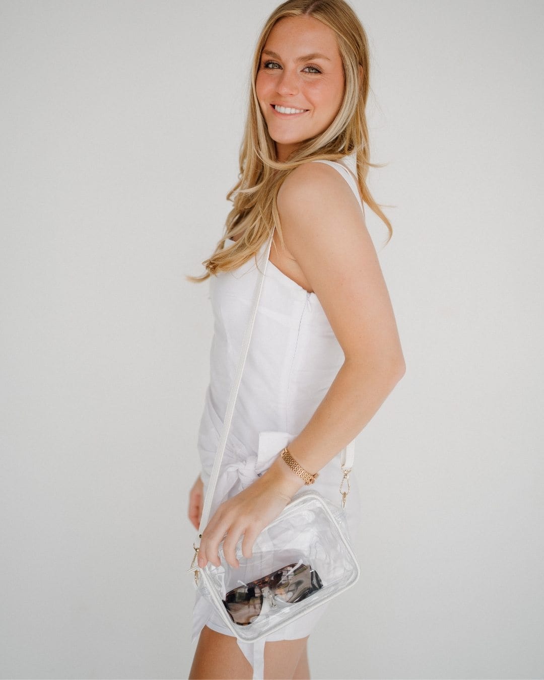 bridget clear stadium approved bag with white vegan leather trim and adjustable, removable crossbody straps