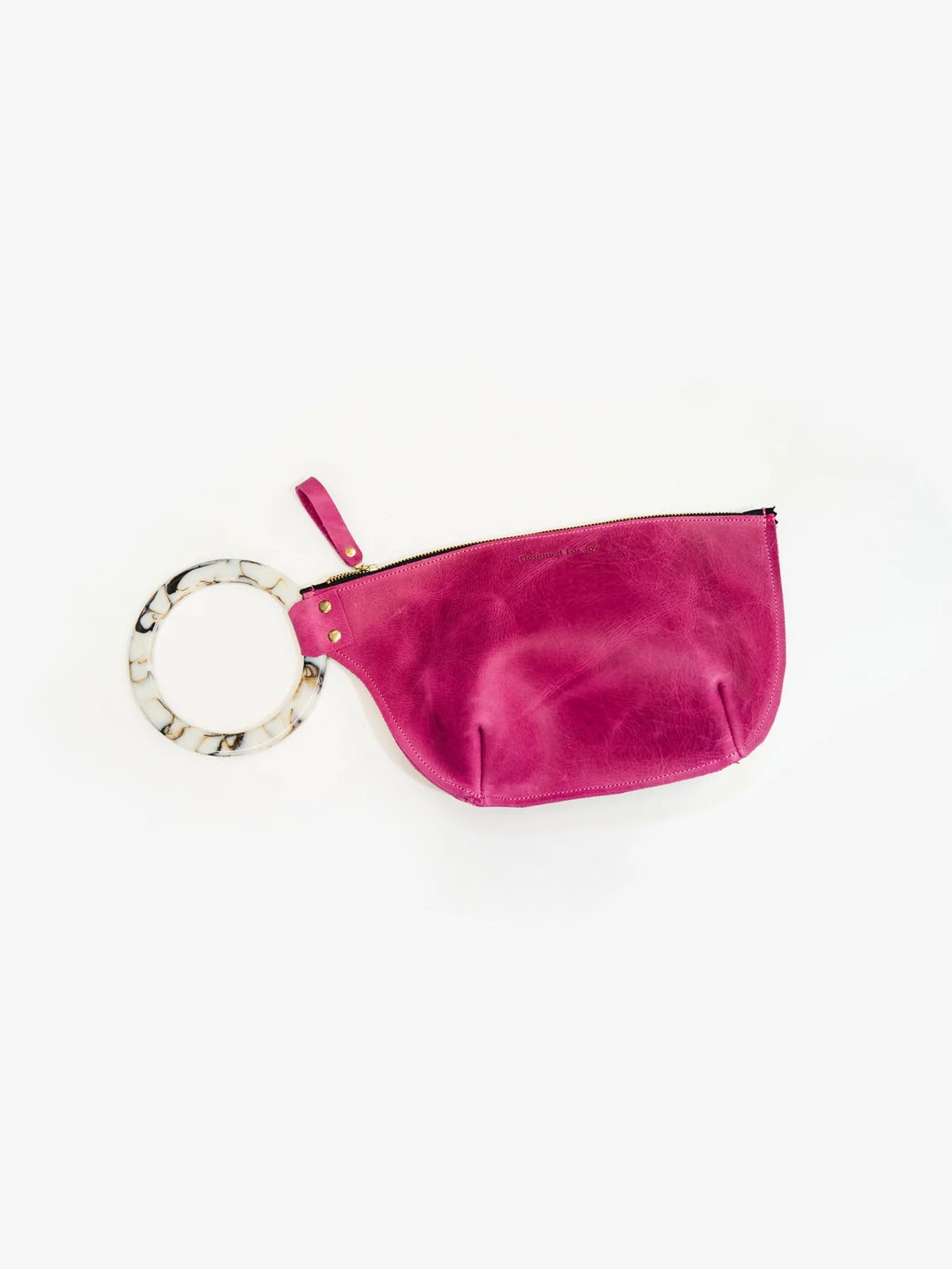 designed for joy inez ring handle wristlet in raspberry