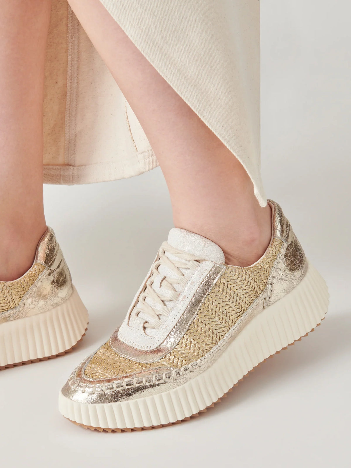 dolce vita dolen sneakers in gold knit