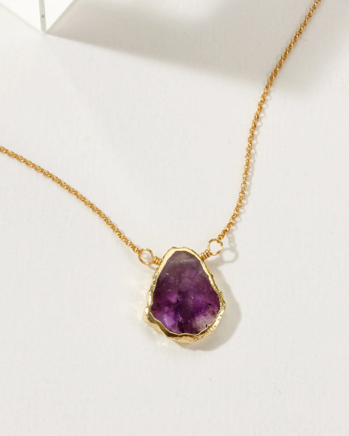 earth wind and fire necklace in 14kt gold plated brass and amethyst by luna norte jewelry