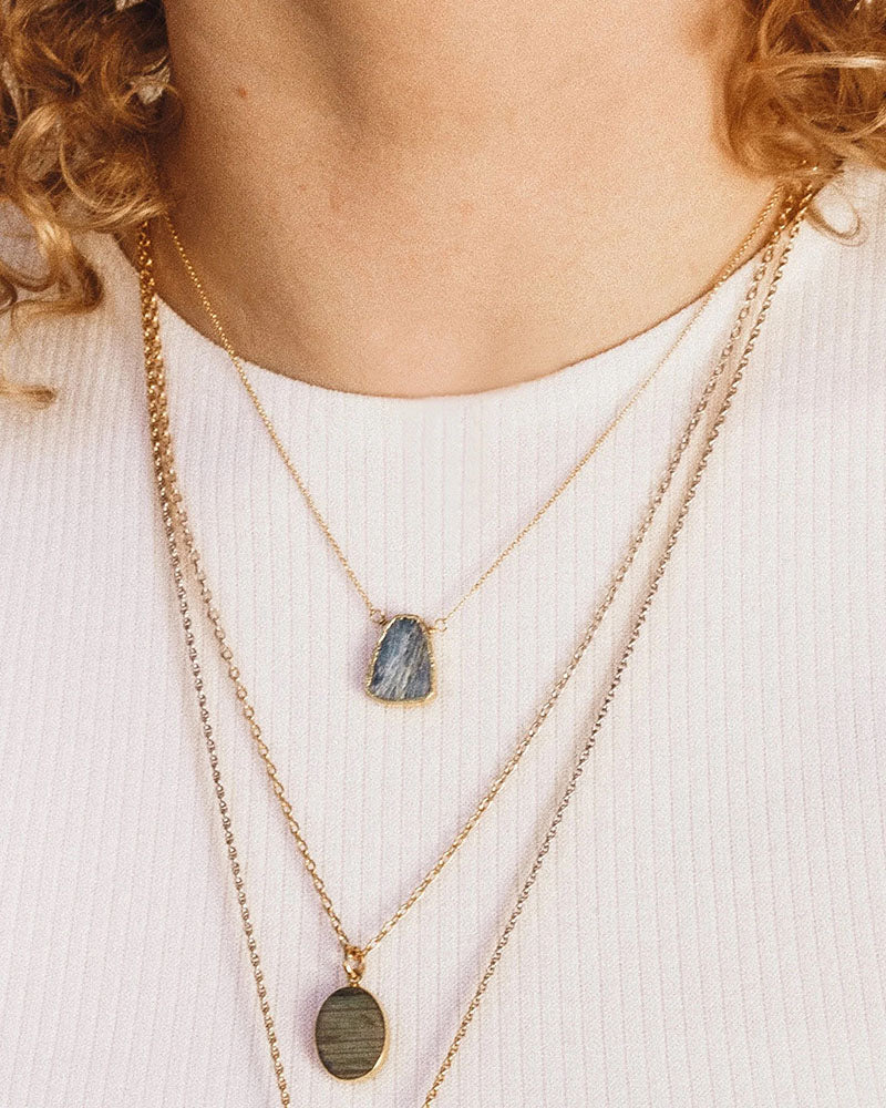 earth wind and fire necklace with kyanite gemstone in 14kt gold plated brass by luna norte jewelry