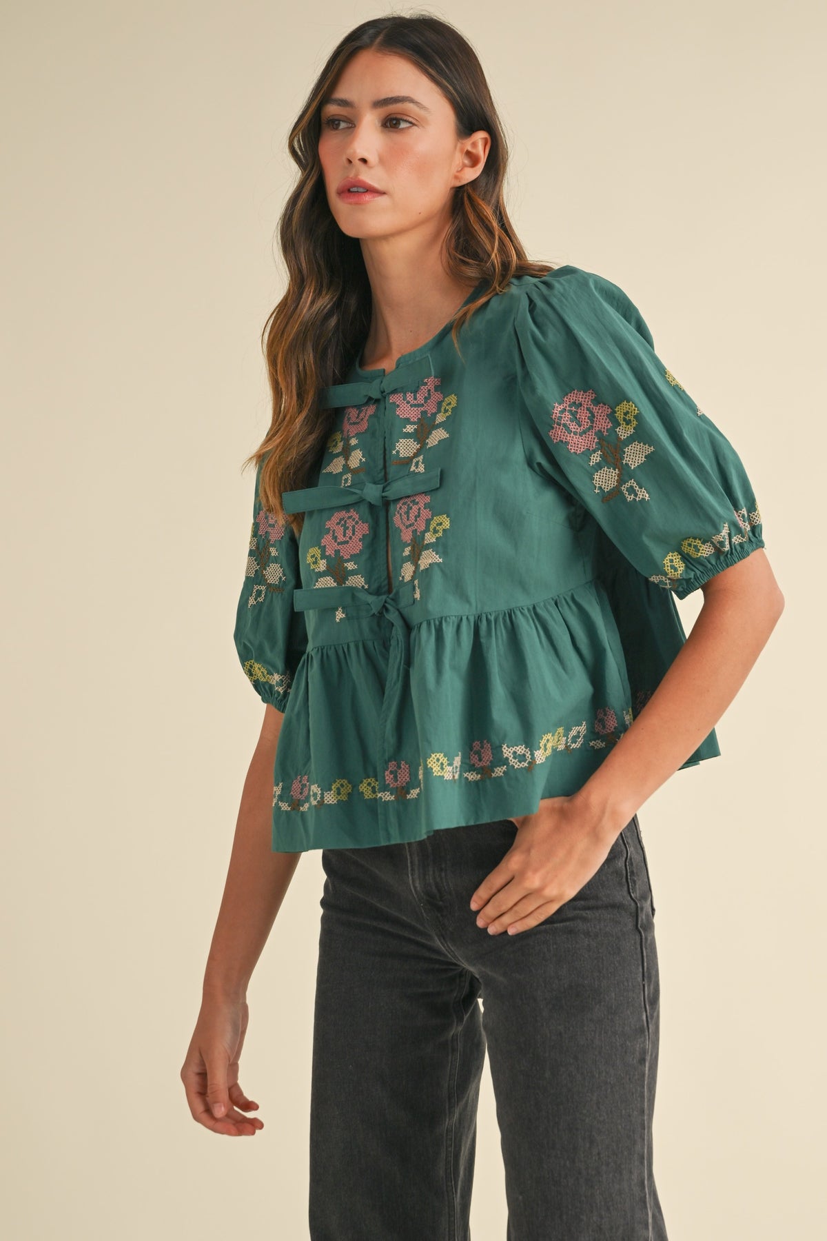 embroidered puff sleeve tie front peplum top in hunter green-side