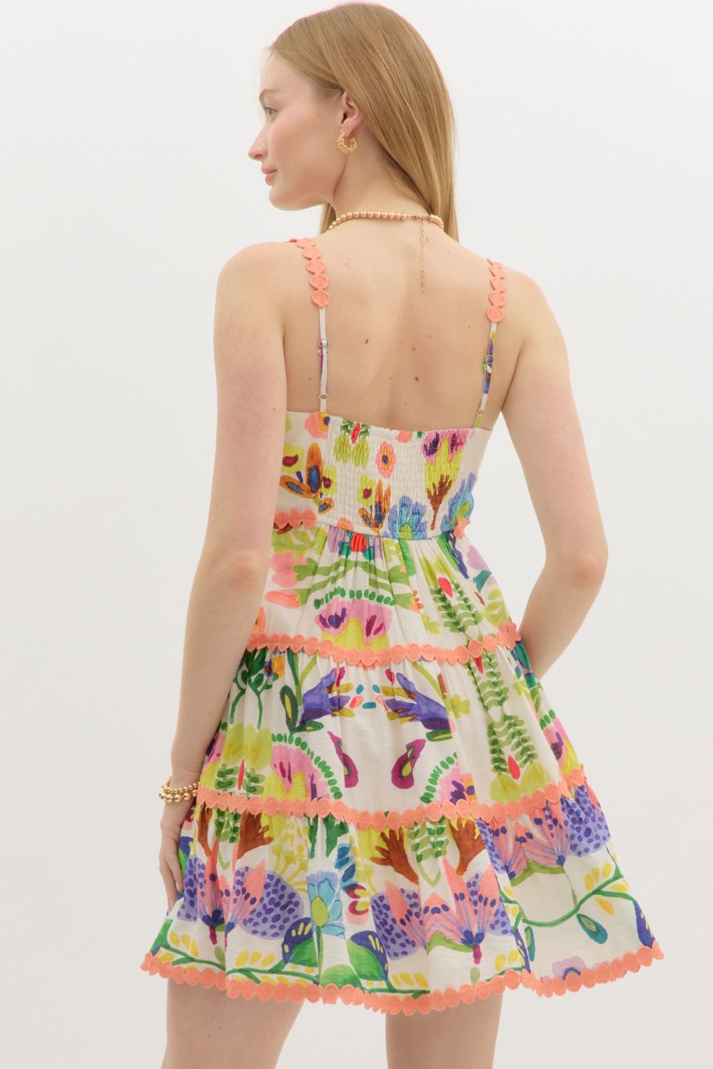 Botanical print trim accented adjustable shoulder strap pullover tiered mini dress in peach green