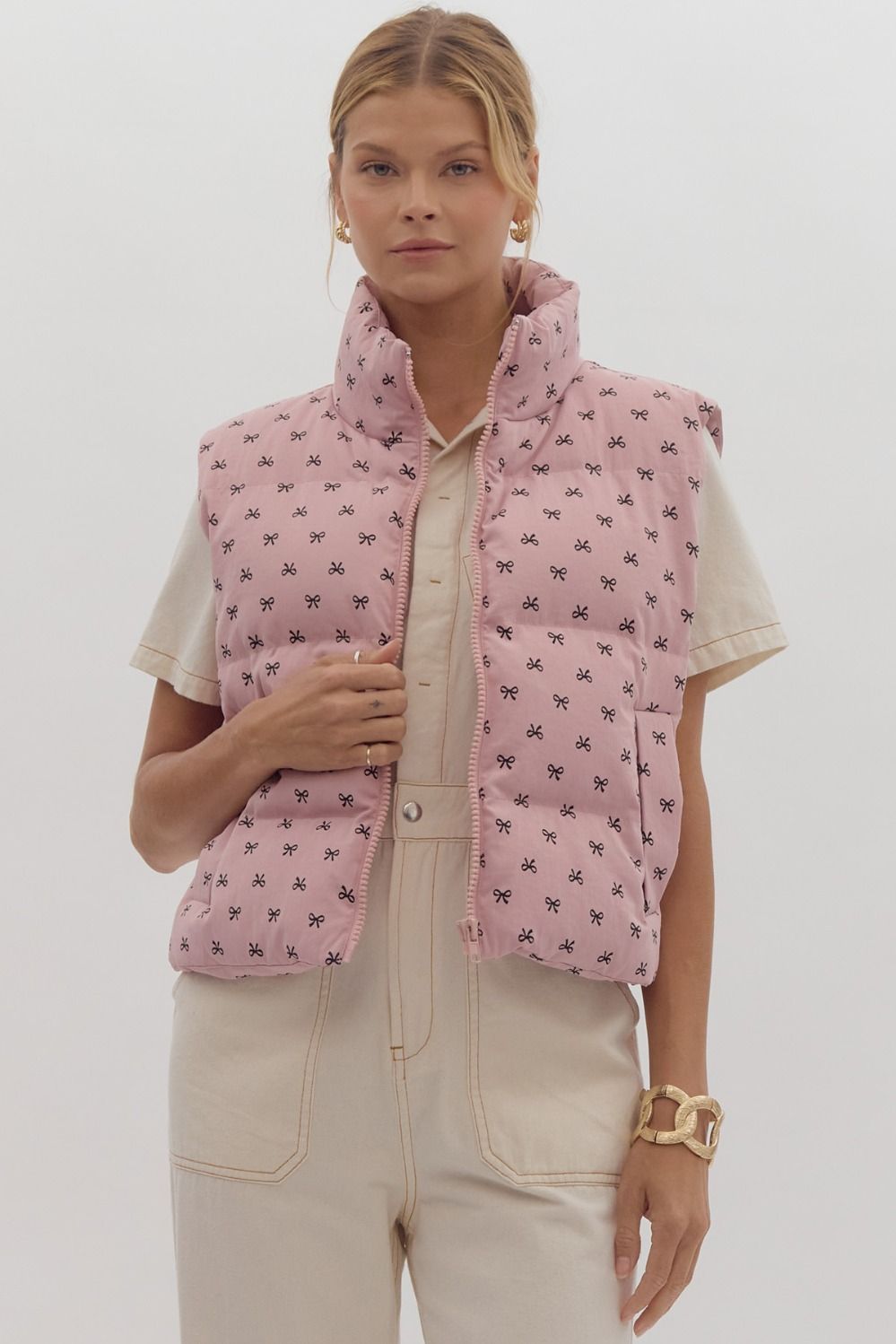 mini bow print puffer vest in pink-front