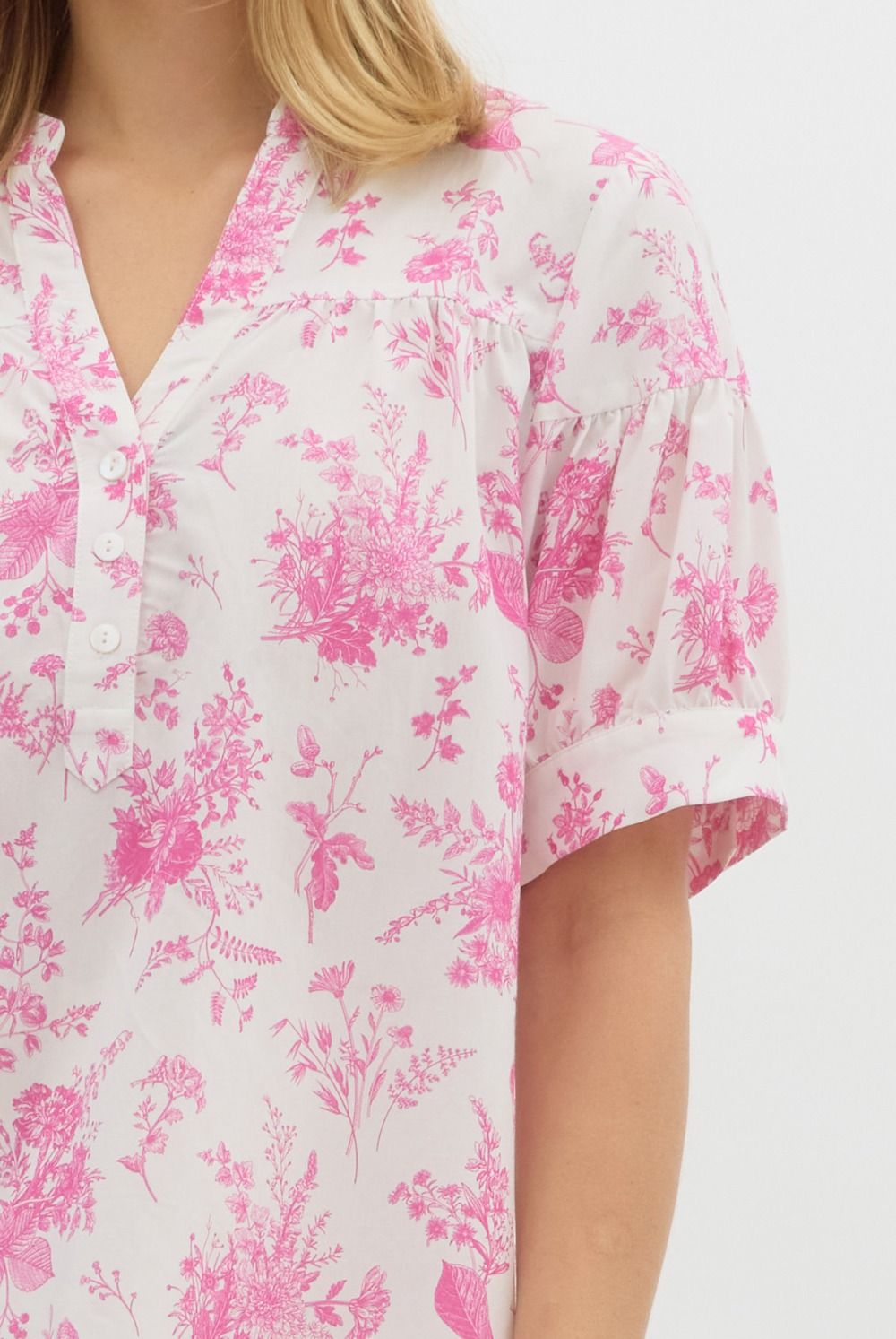 Floral print half button closure pullover top in pink