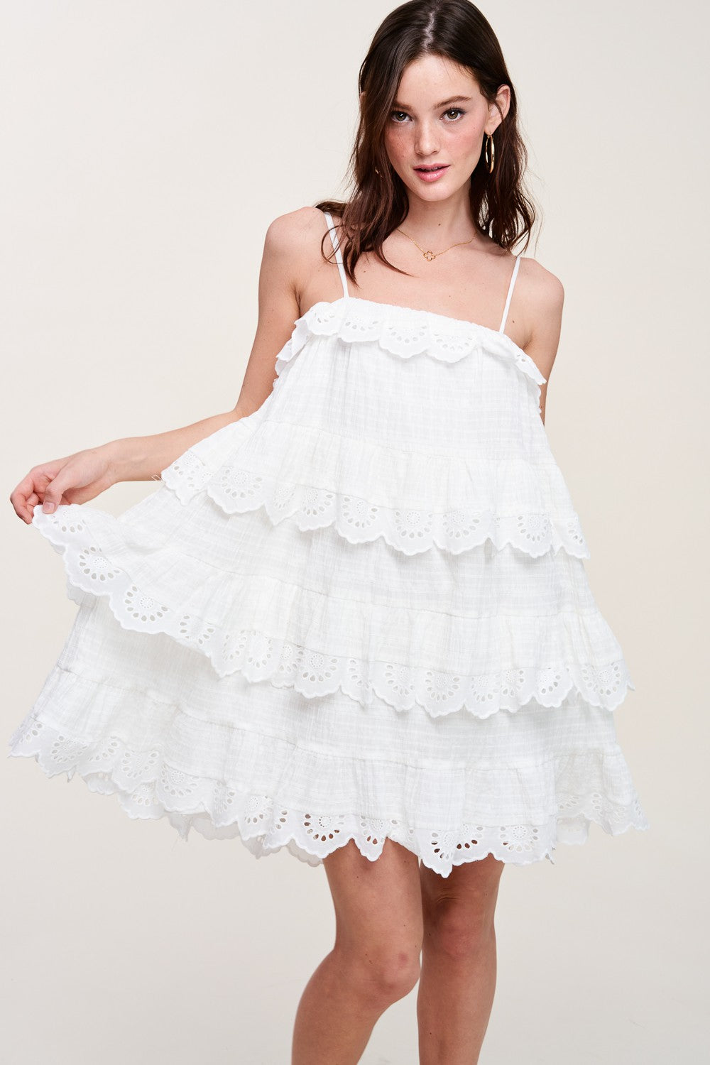 eyelet edge ruffle mini dress in white-front