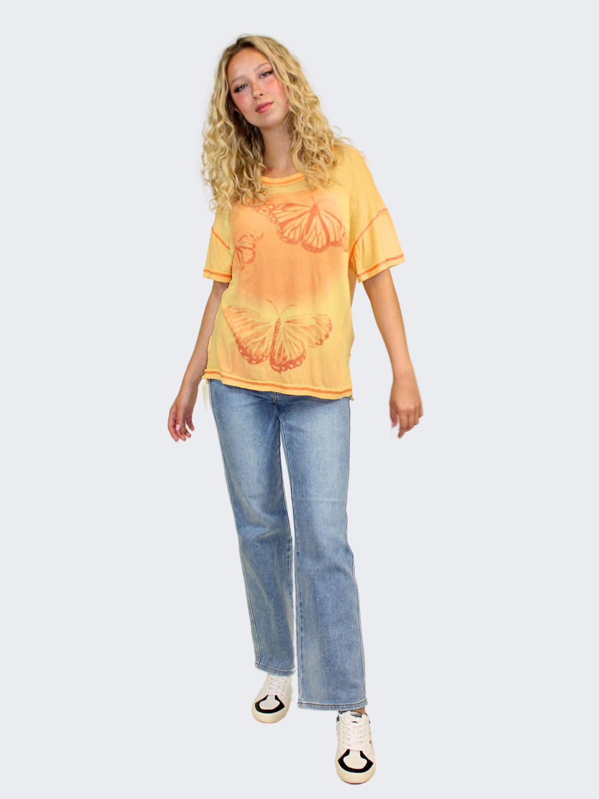 free people we the free flying high graphic tee in orange combo-front view