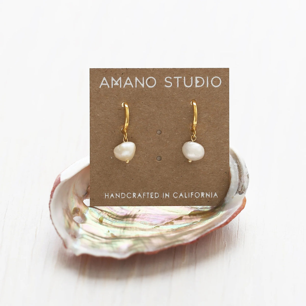 freshwater pearl huggie hoop earrings by amano studio