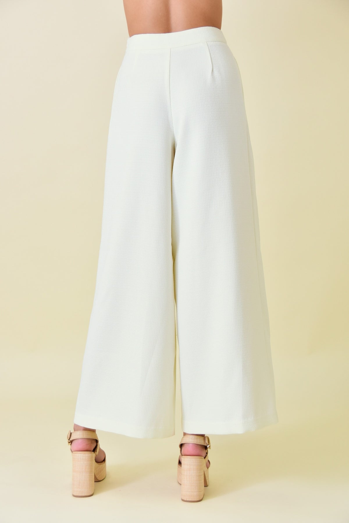 front pleated tailored pant in ivory-back