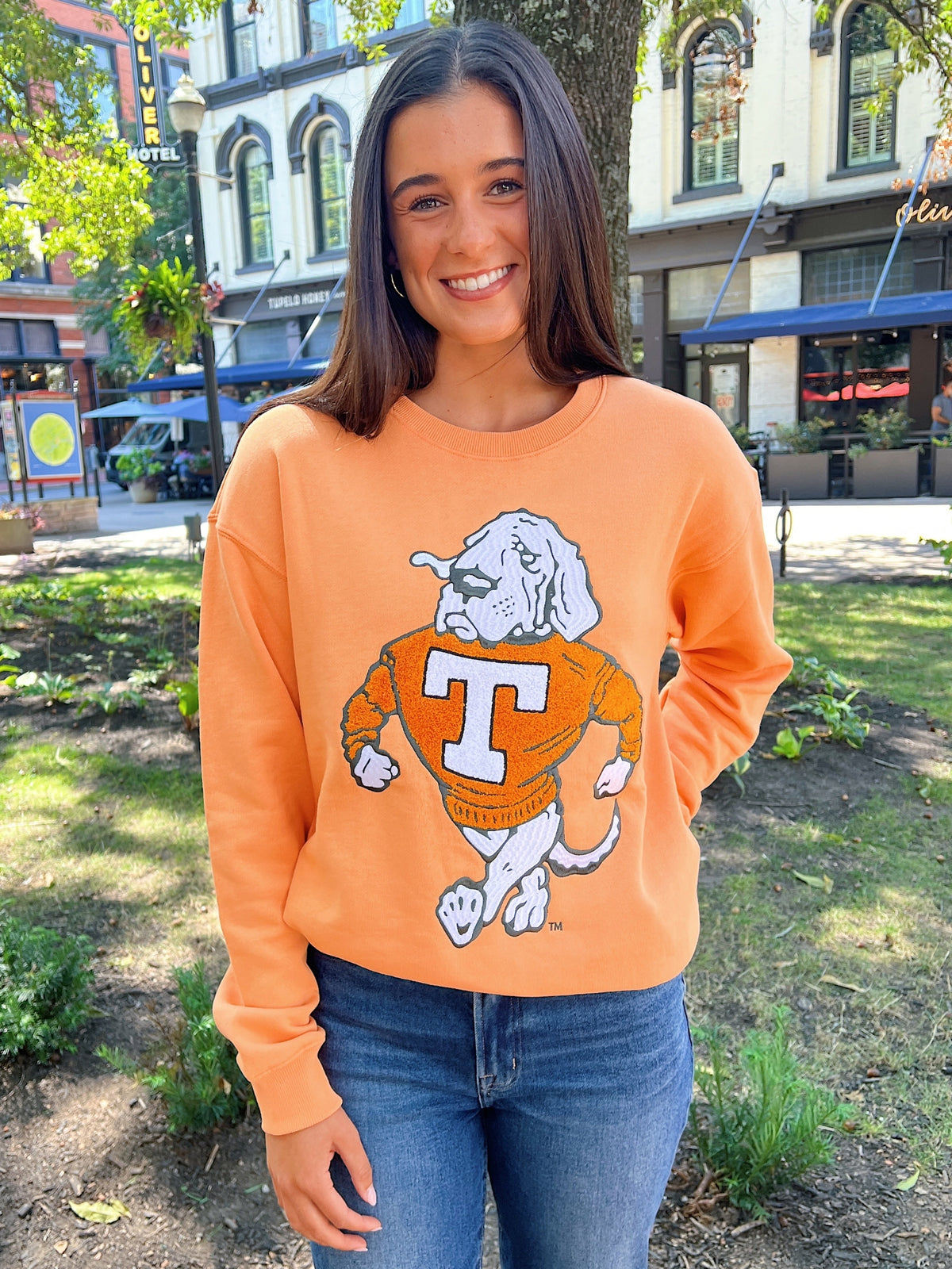 gameday social orange sweatshirt with a mascot logo 