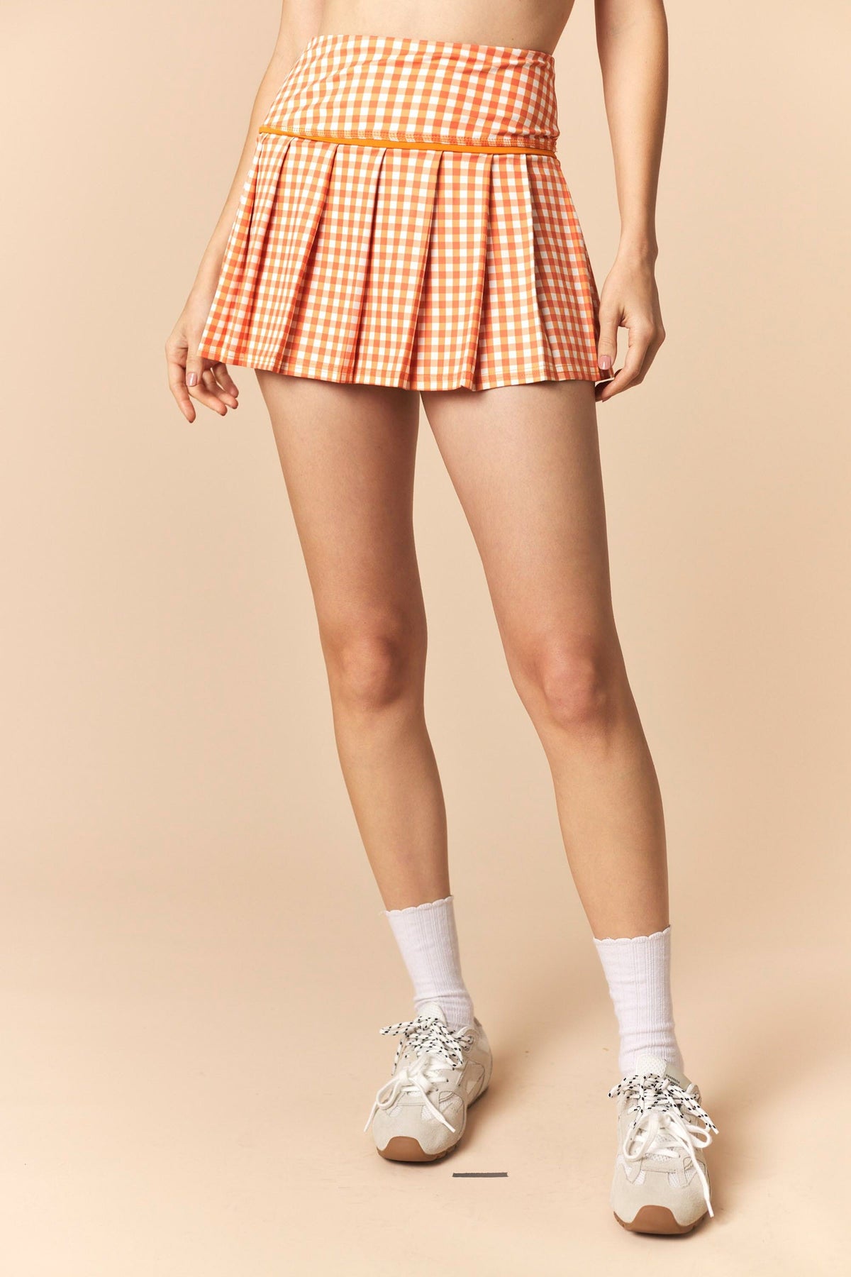 orange and white gingham pleated skort