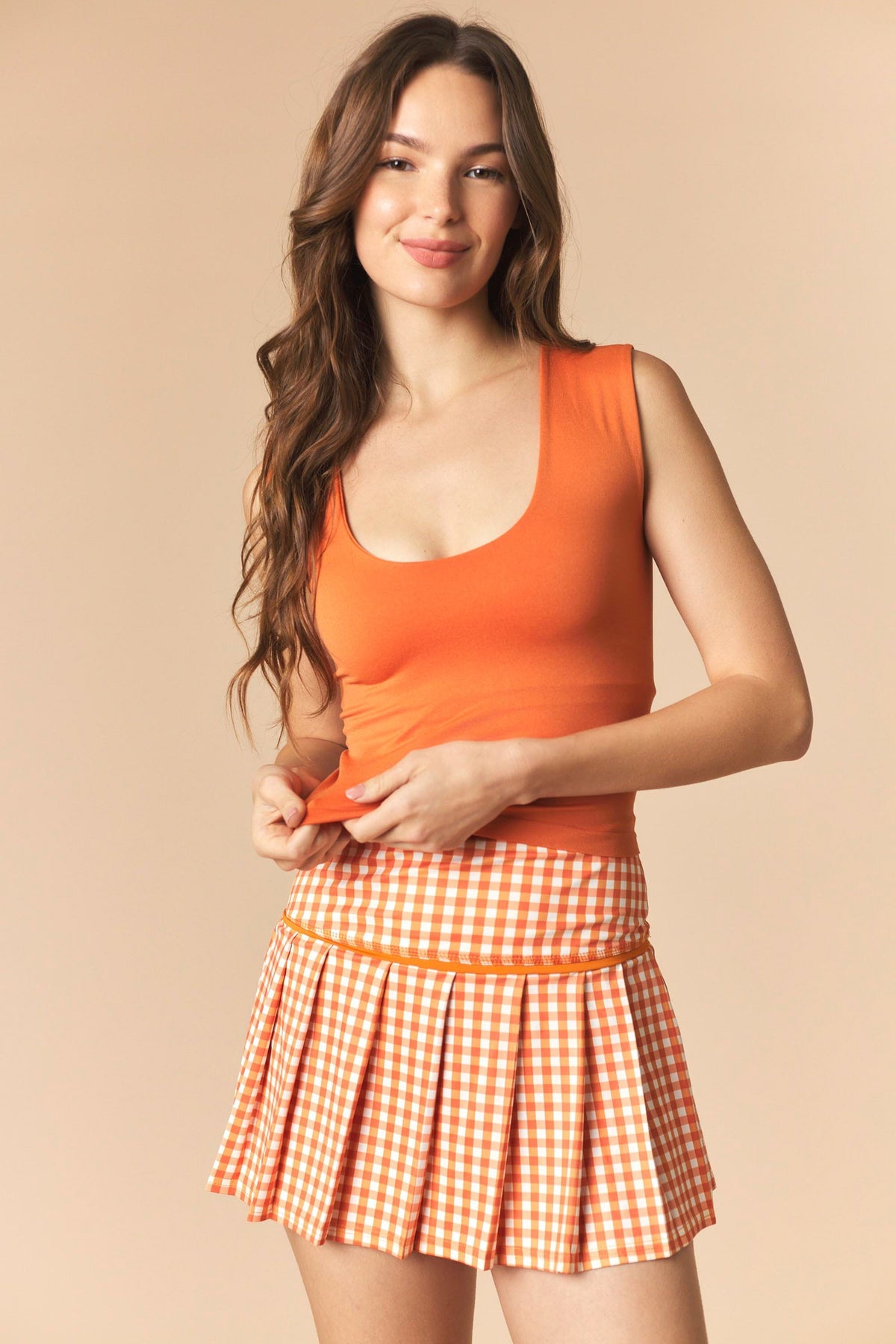 orange and white gingham pleated skort