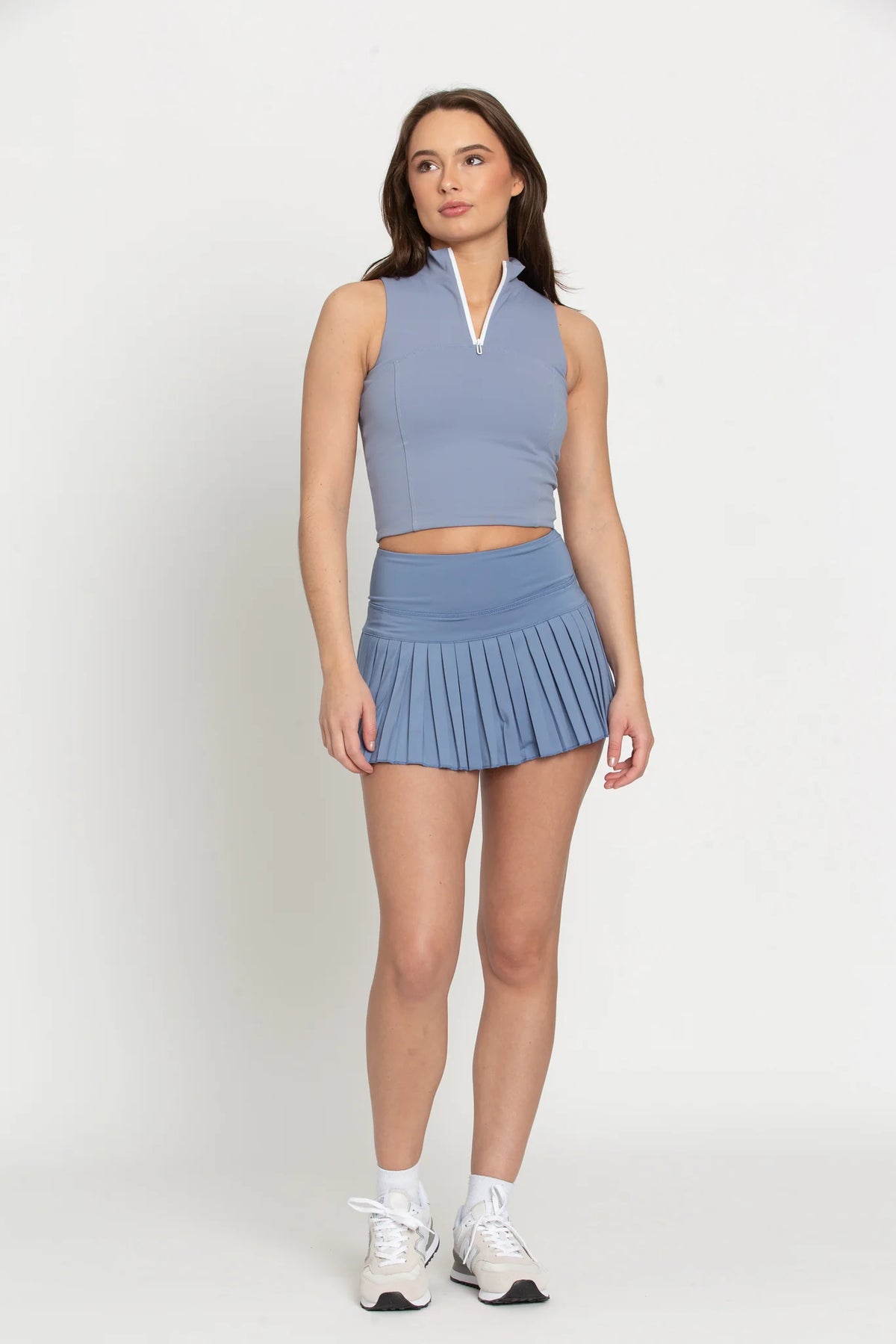 gold hinge pleated tennis skirt in dusty blue