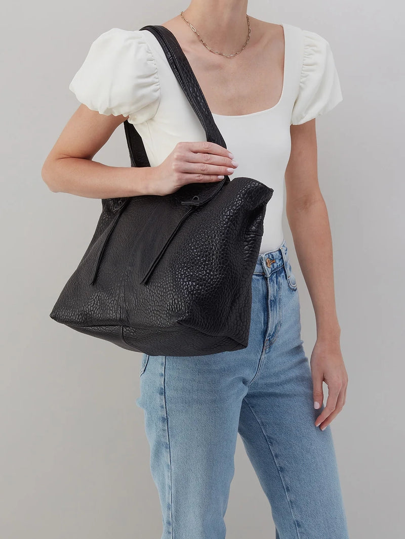 hobo bonita tote bag in black bubble pebbled leather