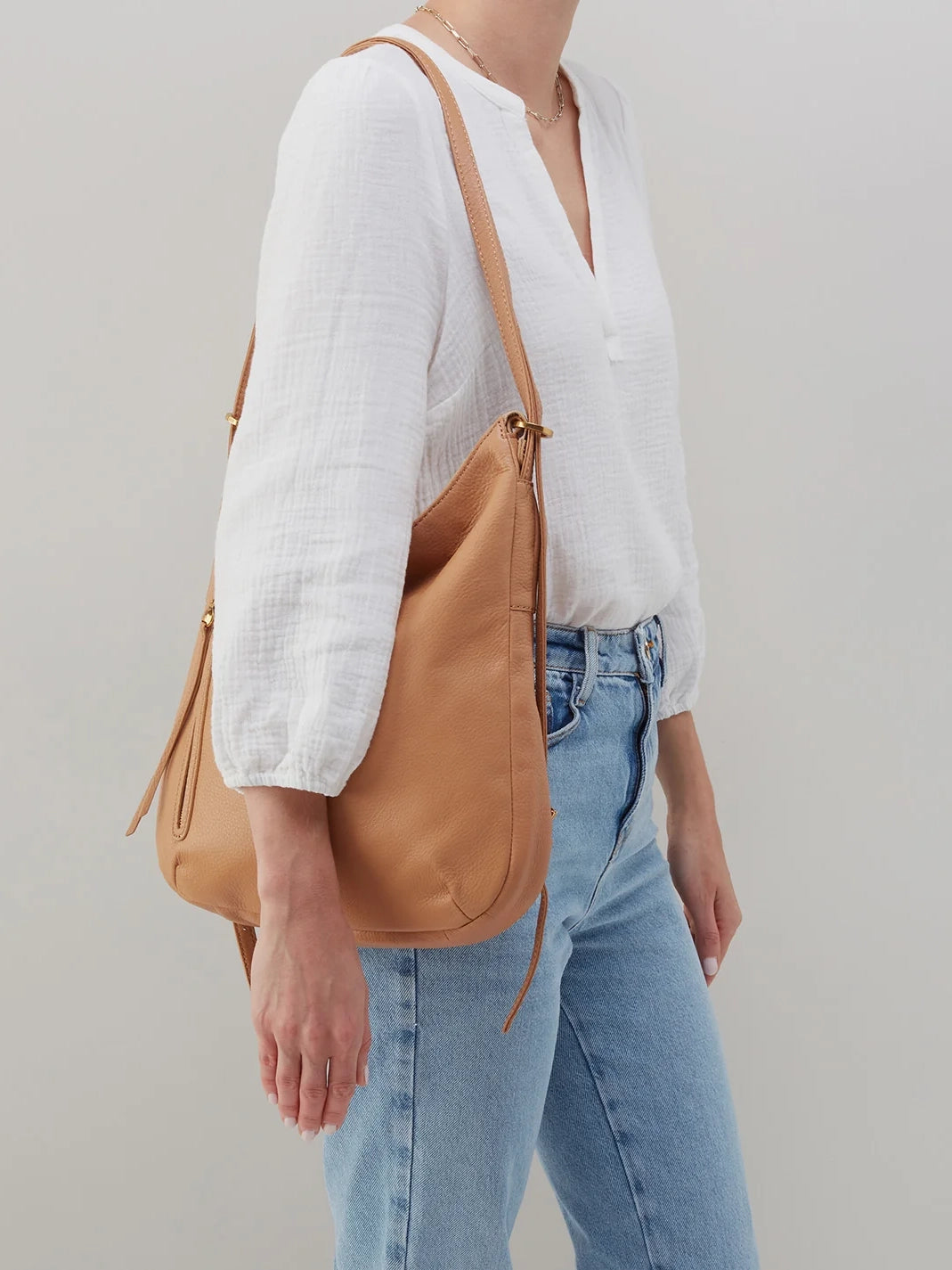 hobo merrin convertible backpack in sandstorm pebbled leather