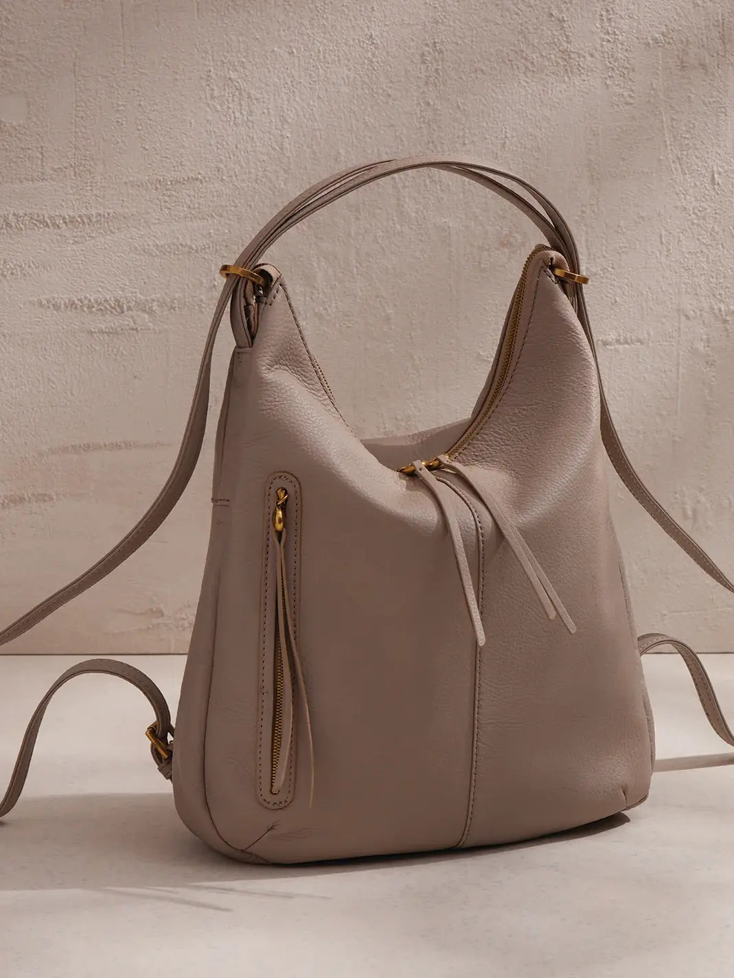 hobo merrin convertible backpack in taupe pebbled leather