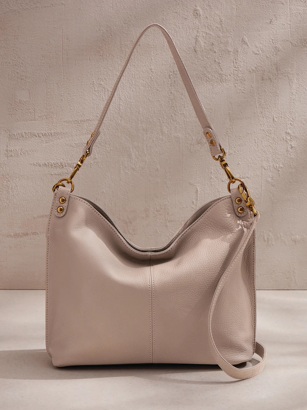 hobo pier shoulder bag in taupe-front view 2