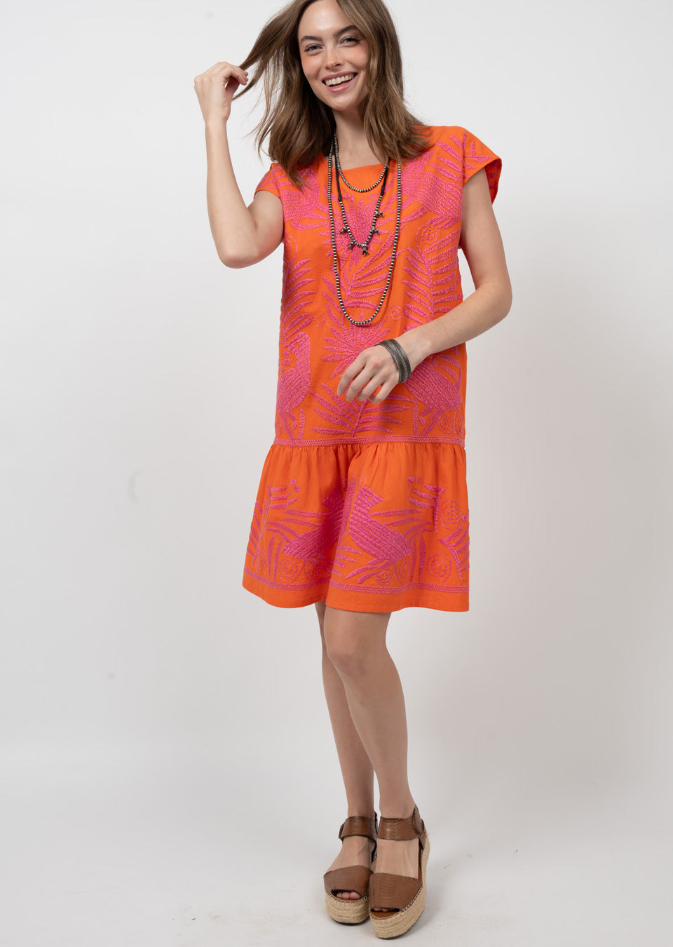 sister mary gaby embroidered dress in tangerine -front model view 2