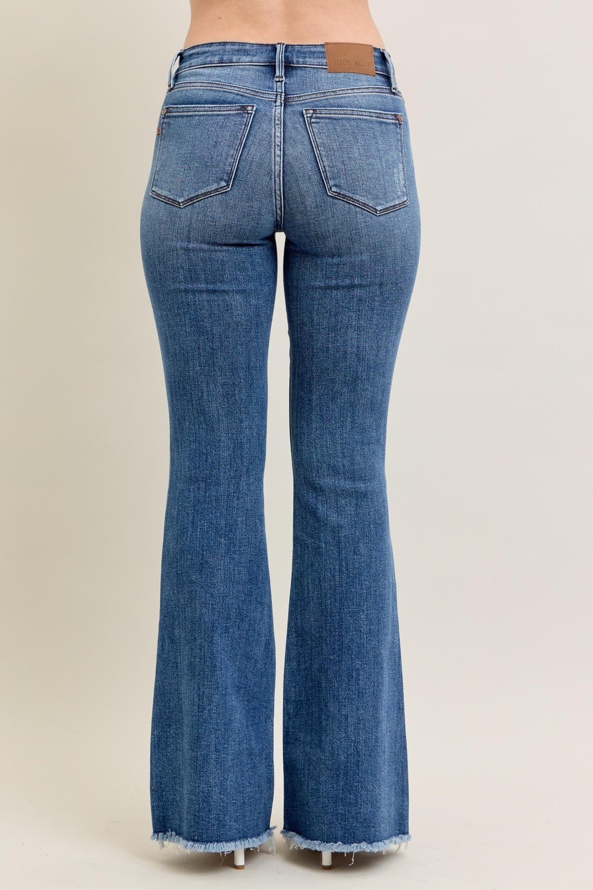 Judy Blue Medium Rise Fray Hem Flare Jeans  in medium 